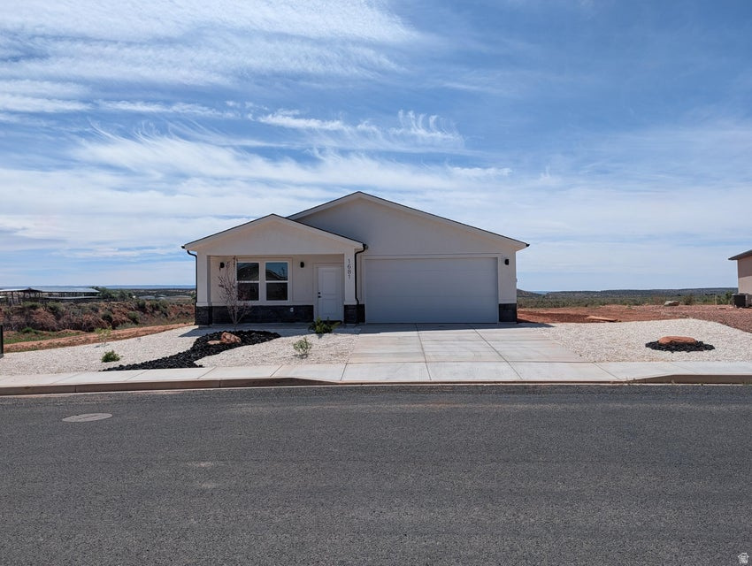 Set on a generously sized lot with no backyard neighbors, this 1,309 sq ft home delivers privacy and wide-open views that stretch beyond your fence line. Step inside and you'll find a clean, modern layout with 3 bedrooms and 2 bathrooms, designed for easy living whether you're settling in full-time or creating a getaway. The open-concept design connects living, dining, and kitchen areas seamlessly, making the space feel larger than its footprint. Natural light pours in, and the back of the home becomes the focal point--framing those uninterrupted desert views that make Kanab so special. What stands out here isn't just the home--it's the opportunity. With Kanab's growing popularity as a destination near Zion, Bryce Canyon, and Lake Powell, this property positions itself as a strong candidate for a vacation rental, second home, or investment hold. Brand new construction means low maintenance, modern efficiency, and a fresh start--no projects, no updates, just move in and enjoy. If you've been looking for a clean, well-built home with space behind you and potential ahead of you, this one checks the boxes.
