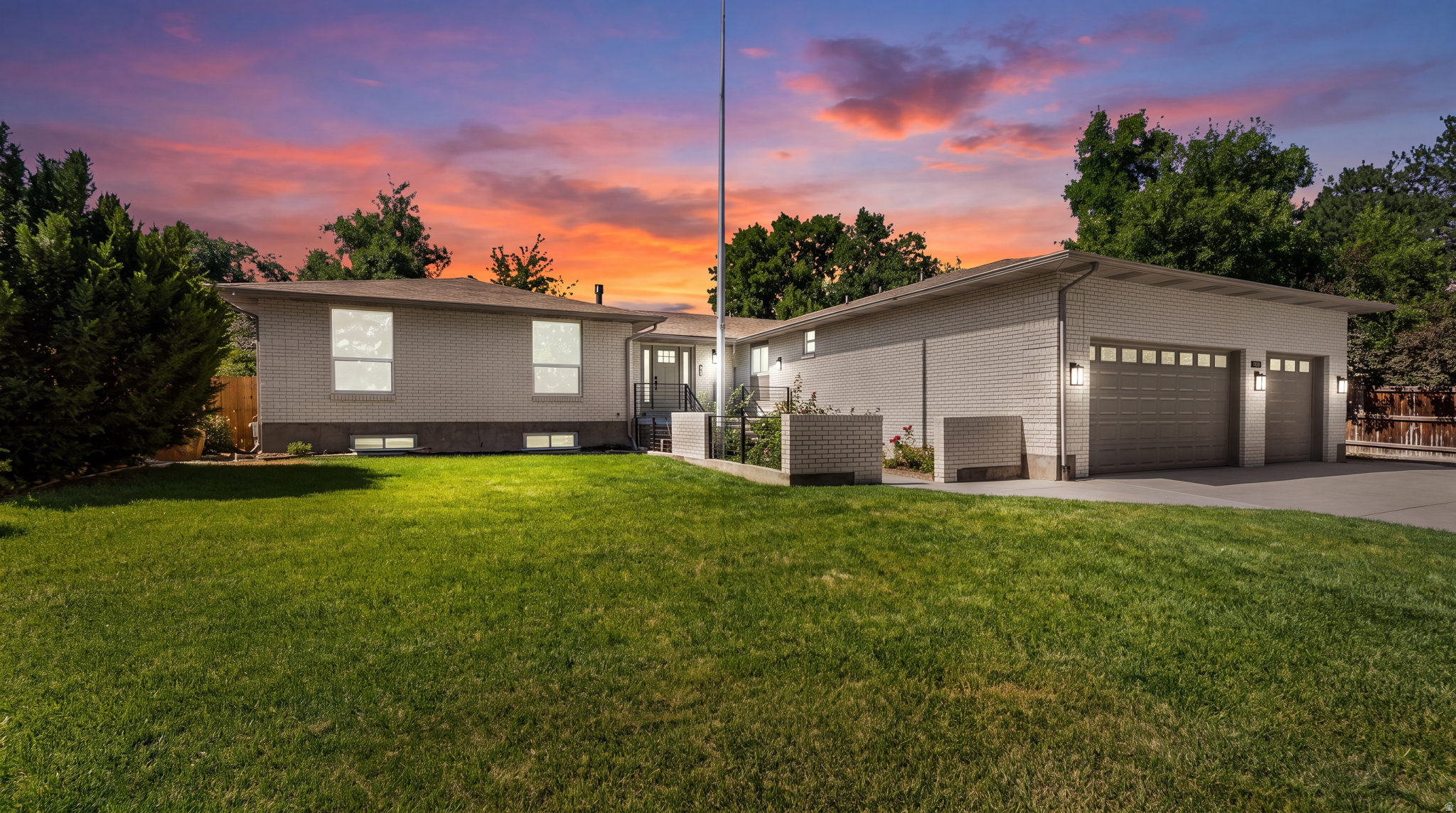 Welcome to this stunning, fully renovated Holladay estate where timeless design meets modern luxury. Offering 4,470 square feet of thoughtfully curated living space on nearly half an acre, this exceptional residence is tucked away on a private cul-de-sac surrounded by mature trees in one of Holladay's most coveted neighborhoods, providing a rare blend of privacy, tranquility, and convenience. Step inside to a light-filled open floor plan featuring wide-plank flooring, custom finishes, sophisticated lighting, and seamless indoor-outdoor flow. The heart of the home is a spectacular chef's kitchen featuring a 48-inch professional range, integrated refrigerator, pot filler, custom two-tone cabinetry, expansive quartzite countertops and island, butler pantry with a double oven, and abundant storage, perfect for both everyday living and entertaining. The luxurious primary suite serves as a private retreat, complete with a spa-inspired bathroom featuring dual vanities, a freestanding soaking tub, an oversized walk-in shower, and elegant designer finishes. Two additional main-level bedrooms are paired with a beautifully appointed bathroom that rivals a luxury hotel experience. Downstairs, enjoy exceptional flexibility with a fully finished lower level featuring a spacious family room centered around a cozy wood-burning fireplace, a wet bar kitchen, three additional bedrooms, and two bathrooms. Separate living spaces offer ideal accommodations for guests or the potential for a future accessory dwelling unit (ADU). Dual laundry rooms on both levels add everyday convenience. Outside, the expansive backyard offers a peaceful, private setting framed by mature trees, ideal for entertaining, recreation, or future customization. Additional highlights include an oversized 3-car garage, RV parking, generous storage, and an unbeatable location just minutes from top-rated schools, parks, shopping, dining, and mountain recreation. With its perfect blend of luxury, functionality, and location, this home presents an exceptional opportunity to enjoy the lifestyle you've always dreamed of. Don't miss your chance to make this Holladay masterpiece your own, schedule your private tour today. Square footage figures are provided as a courtesy estimate only and were obtained from county record. Buyer is advised to obtain an independent measurement.