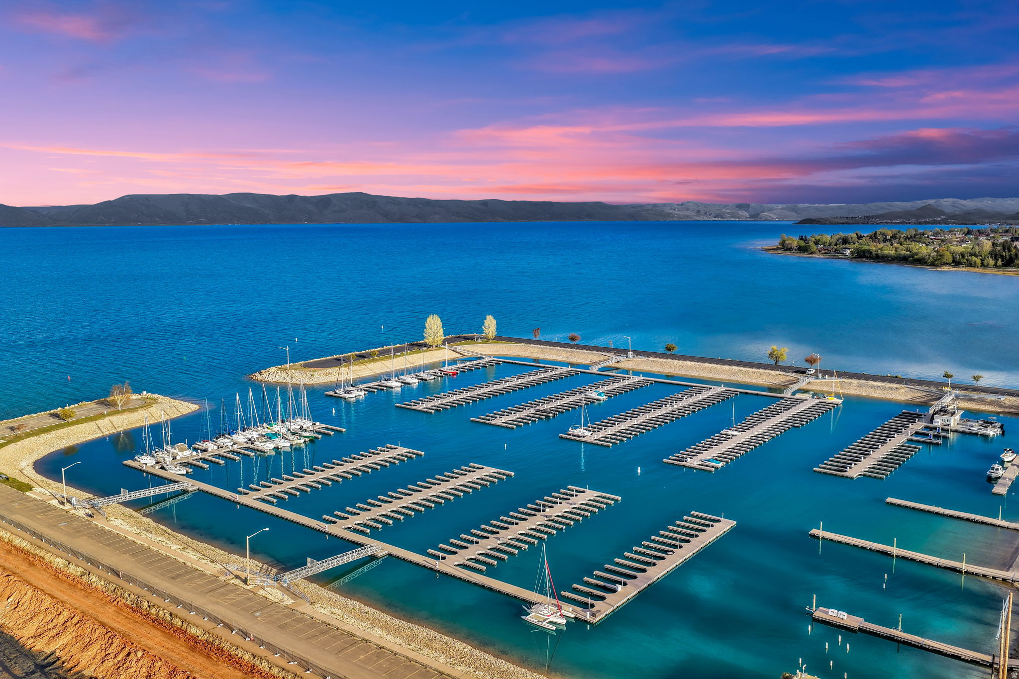 Wake up to the kind of Bear Lake views you normally only see on postcards. This stunning lot is perfectly positioned to capture sweeping panoramas of the lake, surrounding mountains, and big open skies-an ideal setting for a dream cabin, vacation getaway, or year-round home. Enjoy the best of Bear Lake living with easy access to the water, beaches, boating, and endless outdoor recreation, plus nearby dining, shopping, and year-round adventures. Whether you're looking for peace and privacy, or a home base for weekends packed with fun, this lot delivers the location, scenery, and lifestyle you've been searching for. Don't forget to check out my other available lots also listed near Bear Lake -more incredible land opportunities waiting for you! http://www.lakeviewbearlake.com/  WATER CONNECTION FEE HAS BEEN PREPAID!