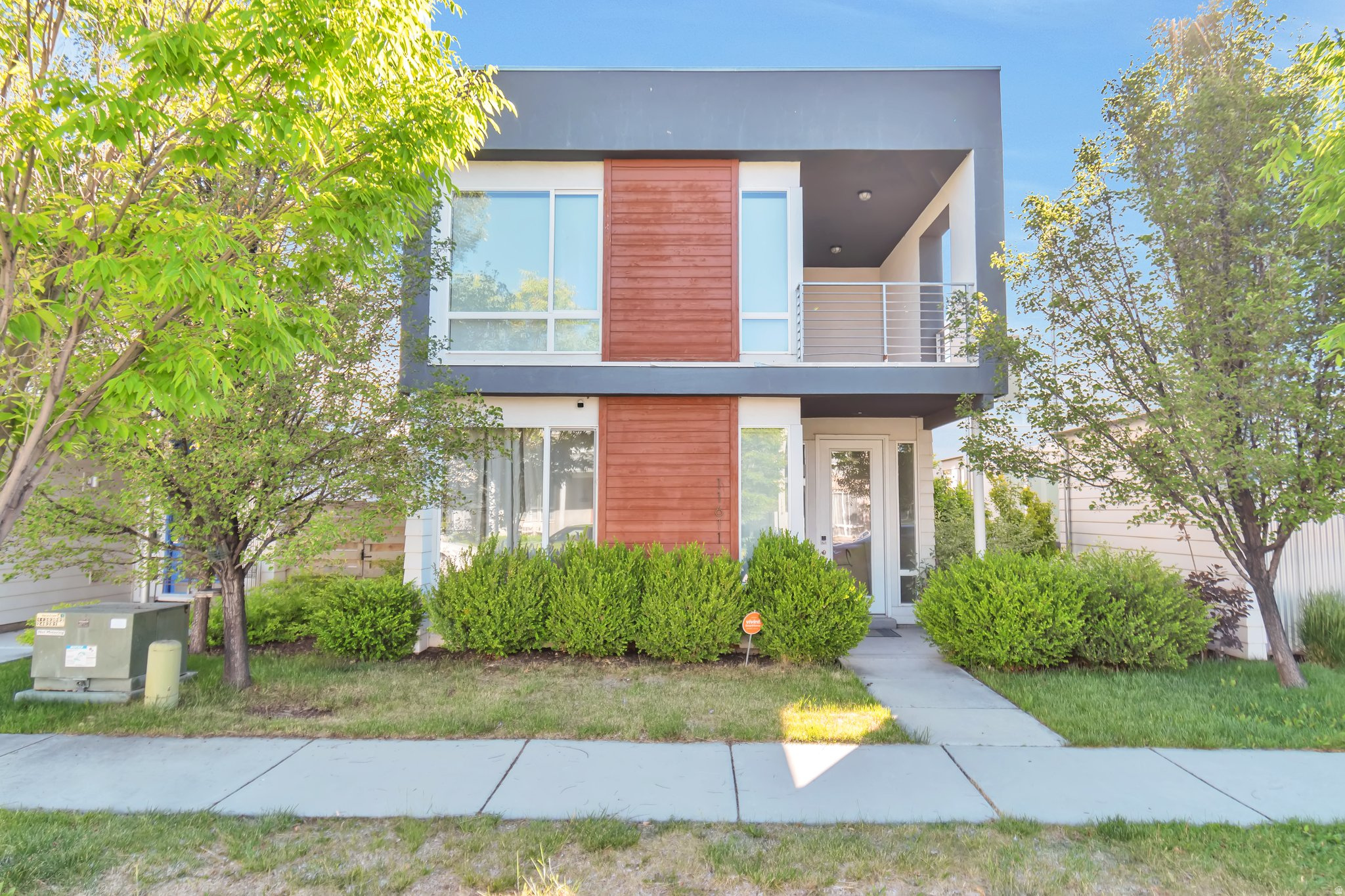 **$10K PRICE DROP - MOTIVATED SELLER*** Built in 2014 and thoughtfully upgraded throughout, this energy efficient 4 bedroom, 4 bathroom home is truly move in ready. The solar panels reduce monthly energy bills from day one. Soaring ceilings and oversized windows flood the open concept main floor with natural light. The kitchen features quartz countertops, stainless steel appliances, and soft close cabinetry, with sliding doors opening to a private fenced backyard. Brand new flooring flows through the entire home including the basement, the primary bathroom has been renovated with an upgraded walk in shower, and the spacious primary suite upstairs includes a generous walk in closet, a beautiful ensuite bath, and a private balcony. The fully finished basement adds a fourth bedroom and full bath, ideal for guests or multigenerational living. Additional upgrades include a 5.1 surround sound system, water softener, and designer blinds throughout. Your HOA dues include 500 Mbps fiber internet so your WiFi is covered from day one. Beyond your door, Daybreak delivers an unmatched lifestyle with Oquirrh Lake, a year round heated pool, fitness center with yoga studio, pickleball and tennis courts, parks and trails, the SoDa Row town center with local dining and shops, weekly farmer's markets, and direct UTA TRAX Red Line access to downtown Salt Lake City.