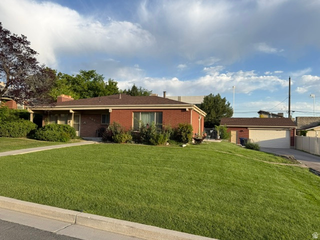 This well-maintained brick rambler sits in an established neighborhood with mature trees, a flat and very private backyard, covered front porch and oversized 2 car detached garage providing storage, space for toys and bikes or a work shop area. This is an excellent opportunity to own a home with your own yard at a price that beats many condos and townhomes.  Square footage figures are provided as a courtesy estimate only and were obtained from SL County Assessor .  Buyer is advised to obtain an independent measurement.