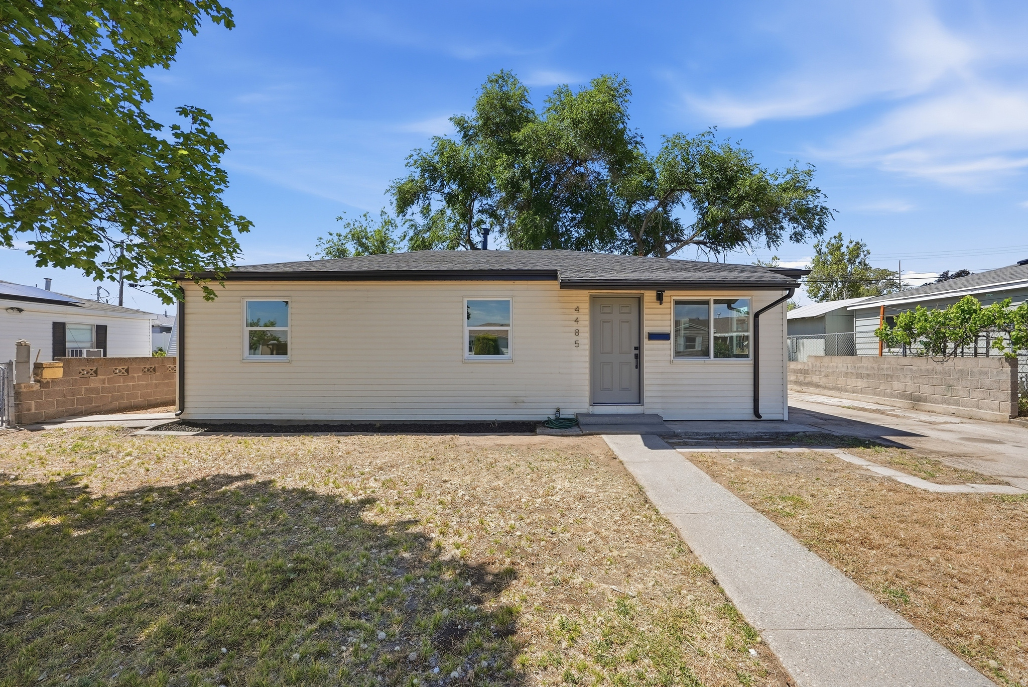 Completely remodeled and move-in ready, this stunning Hoffman Heights home offers the perfect blend of modern upgrades, comfort, and value. Situated on a .14-acre lot in a convenient Kearns location, this single-level home has been thoughtfully renovated from top to bottom, giving buyers the opportunity to enjoy the benefits of a like-new home without the new construction price tag. Inside, you'll find 1,028 square feet of beautifully updated living space featuring an open and inviting layout, luxury vinyl plank flooring throughout the main living areas, fresh carpet in the bedrooms, and abundant natural light from the brand-new windows and sliding glass door. The fully remodeled kitchen is designed to impress with quartz countertops, brand-new stainless steel appliances, a gas range, and modern finishes that make everyday living and entertaining a breeze. The bathroom has also been tastefully updated with matching quartz countertops and stylish finishes. The extensive list of improvements provides peace of mind for years to come, including a brand-new roof, rain gutters, furnace, central air conditioning, water heater, electrical updates, windows, and sliding glass door. Simply move in and enjoy. Outside, the spacious backyard offers a blank canvas ready for your personal touch. Whether you envision a garden, outdoor entertaining space, play area, or custom landscaping, the possibilities are endless. The property also features ample driveway parking, RV parking, and a storage shed in great condition for additional convenience. Located near schools, parks, shopping, dining, and with quick access to Bangerter Highway, commuting and daily errands are a breeze. Opportunities like this don't come along often. With extensive renovations, modern finishes, and an attractive price point, this home is positioned to sell quickly. Schedule your private showing today before it's gone. **TO VIEW FULL MOTION VIDEO OF THIS HOME PRESS THE TOUR BUTTON***THIS HOME IS FEATURED ON TELEVISIONS REAL ESTATE ESSENTIALS ABC4 UTAH SUNDAYS AT 4:30PM *** Square footage figures are provided as a courtesy estimate only. Buyer is advised to obtain an independent measurement & verify all info.