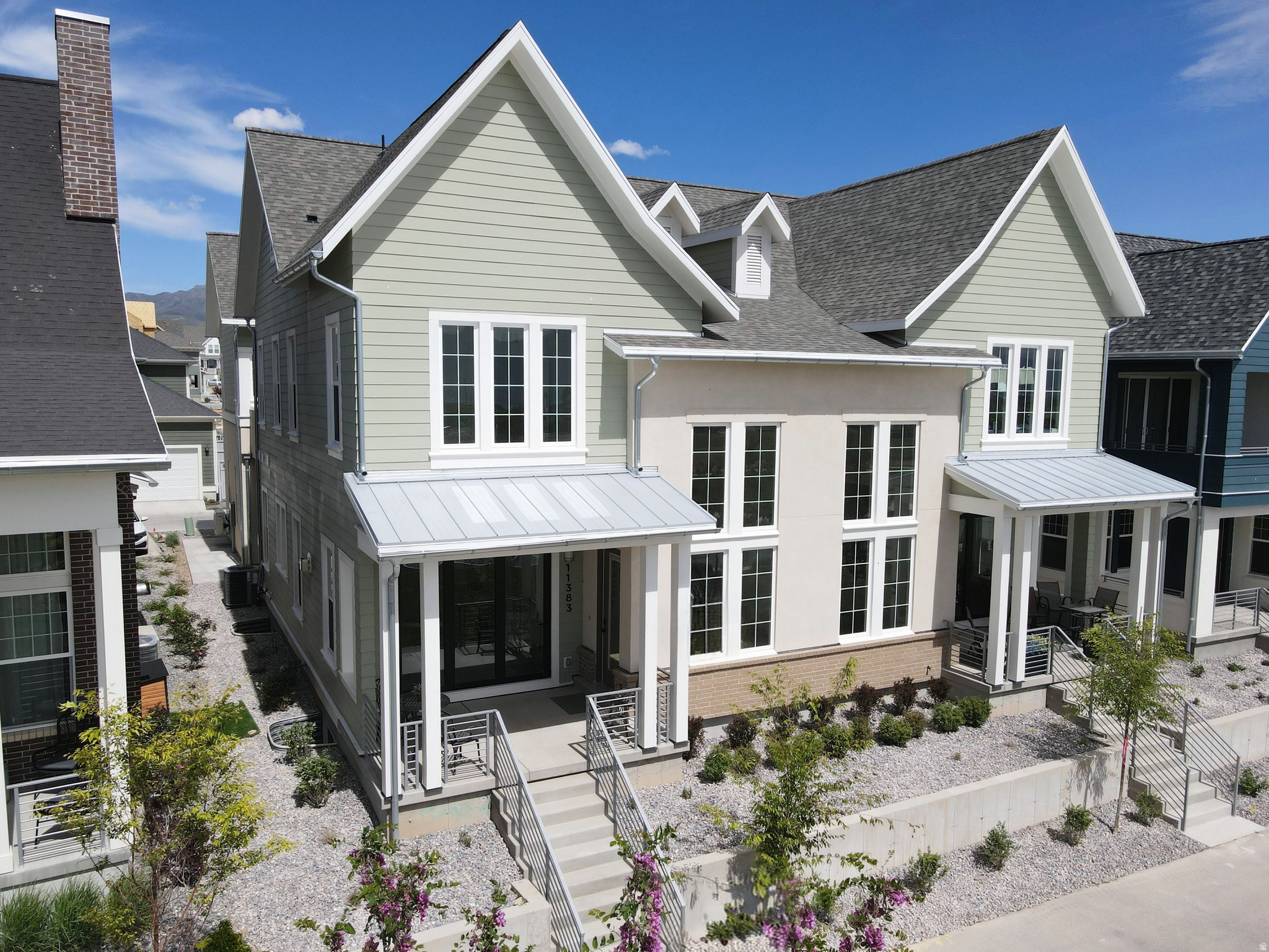 Move-In Ready, Stunning Waterfront Home with Rentable ADU (apartment above the garage) and Spacious 3-Car Garage. Discover the perfect blend of versatility, comfort, and waterfront living with the brand-new Birmingham floorplan. This thoughtfully designed home offers an expansive layout, ideal for modern living and entertaining. The main living area is crafted for seamless indoor/outdoor living, featuring sliding doors that open to a spacious porch for enjoying the views along the waterfront. For those who love to cook, the home includes a large walk-in pantry, offering plenty of storage. The Primary bedroom features an upper deck with a pergola, providing a serene retreat. The standout feature of the Birmingham plan is the attached Accessory Dwelling Unit (ADU), offering endless possibilities-whether it's for rental income, a dedicated guest suite, or an extended living space. List price is a FINISHED ADU, along with the premium waterfront lot and designer upgrades and options!