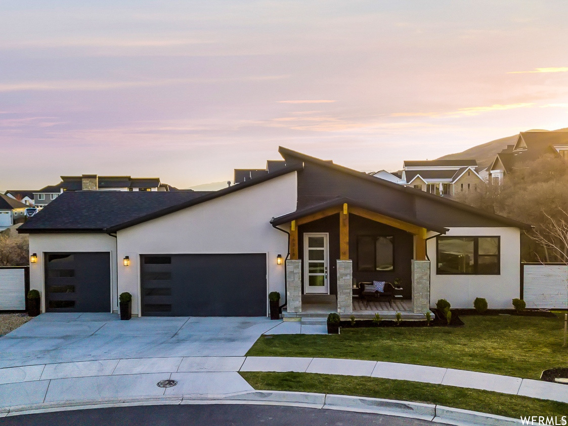 Welcome to your dream home in the coveted Skye Estates community! Set in a quiet cul-de-sac, surrounded by nature and stunning views, this house continues to impress inside and out. The open-concept main floor is perfect for everyday living and entertaining. Enjoy a kitchen featuring a large gas range, quartz countertops, stylish cabinetry, and a dining area that flows effortlessly into the family room that has 5.1 surround sound ceiling speakers.  The modern kitchen is as stunning as it is functional. An ideal layout of 5 bedrooms, 3 bathrooms, and an additional dedicated office/bonus bedroom; this home has plenty of space for all. The main level primary suite does not disappoint. Spacious and open with all the amenities, it is the perfect owner's retreat. The basement continues to impress with a separate kitchen and large family room perfect for games or family movie night.  An additional 2 bedrooms, custom bathroom, and a bonus flex room plumbed for a hair salon, hobby room, gym, or if needed, another bedroom.  With a basement walk out, you have the possibility of a mother-in law apartment or an ADU, (additional dwelling unit).  Each level has its own thermostat to control the temperature for that area. An oversized three-car garage provides ample room for vehicles and additional storage and is complete with built in shelving and an EV charging station. Step outside onto the deck or patio to grill, relax, and soak in the scenery with family and friends. The backyard backs onto open space that has brush oak and a seasonal stream, giving you extra space and privacy while being surrounded by nature. There are ample outdoor entertaining areas with an outdoor gas fire-pit, a play area for the kids, and a dedicated garden space that gives you the chance to grow your own fresh produce . The charming front porch is the perfect spot to unwind and take in peaceful evenings with beautiful mountain views. Solar panels keep the utility bills low. Last but not least, enjoy your day shopping at Traverse, hiking in your backyard, biking on award-winning trails, skiing at one of the many world-class resorts, or heading up the canyon, your adventure is all within 30 minutes or less. Be impressed by all the style and appeal this home has to offer.  Enjoy resort-style living with HOA amenities including a clubhouse with a theater room, pool, gym, 2 playgrounds, and BBQ area. Other features: Upgraded furnace with a whole-home air purifier, filtration, and controlled humidifier. Gas line on deck for BBQ, outdoor gas fire pit.  Square footage figures are provided as a courtesy estimate only and were obtained from county records.  Buyer is advised to obtain an independent measurement.
