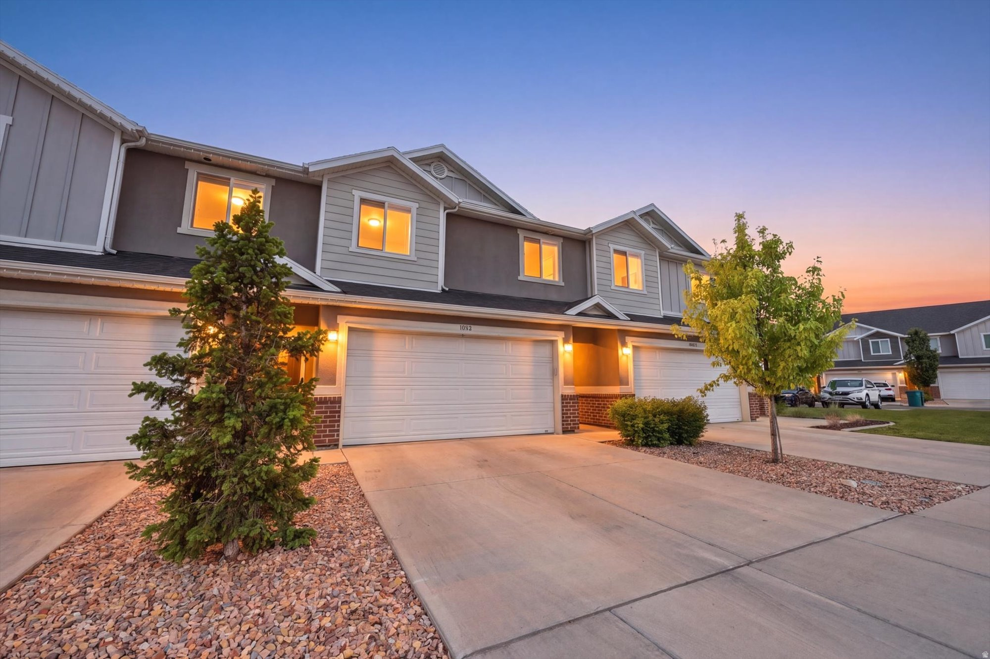 Welcome to this charming and updated townhome in a prime Orem location that is close to shopping, dining, and entertainment in Orem, Vineyard, and Provo. To add to this incredible location it is also just a few minutes drive from I-15 and Utah Lake recreation areas. The stunning community features Lake and Mountain views, playgrounds, a pool, clubhouse, gym, and the HOA includes internet, water, trash, cable, and sewer, minimizing your utility bill while receiving access to state of the art amenities. On the first floor of the home you will find an open concept floor-plan that connects the kitchen, dining, and living room seamlessly. The living room has 2 story great room ceilings with large windows that allow large amounts of natural light to fill the space. The kitchen features beautiful quartz countertops, stainless steel appliances, a large pantry, an upgraded backsplash, and updated drawer and cabinet pulls. A large sliding glass door leads to the back patio and green space, where you can enjoy the outdoors without having to worry about the hassle of yard maintenance. On the second floor of the home you will find the primary bedroom which connects to the ensuite that features a large walk in shower, quartz counter tops, white cabinets, tile flooring, and dual sinks. The bathroom connects to the spacious walk in closet. Down the hall there is the laundry room, 2 more well appointed bedrooms, and an additional full bathroom. Additional features of this stunning townhome include a 2 car garage, long driveway, closet and storage space, tankless water heater, custom accent walls in the dining area and one of the bedrooms, and a half bathroom on the main floor for added convenience. Square footage figures are provided as a courtesy estimate only. Buyer is advised to obtain an independent measurement.