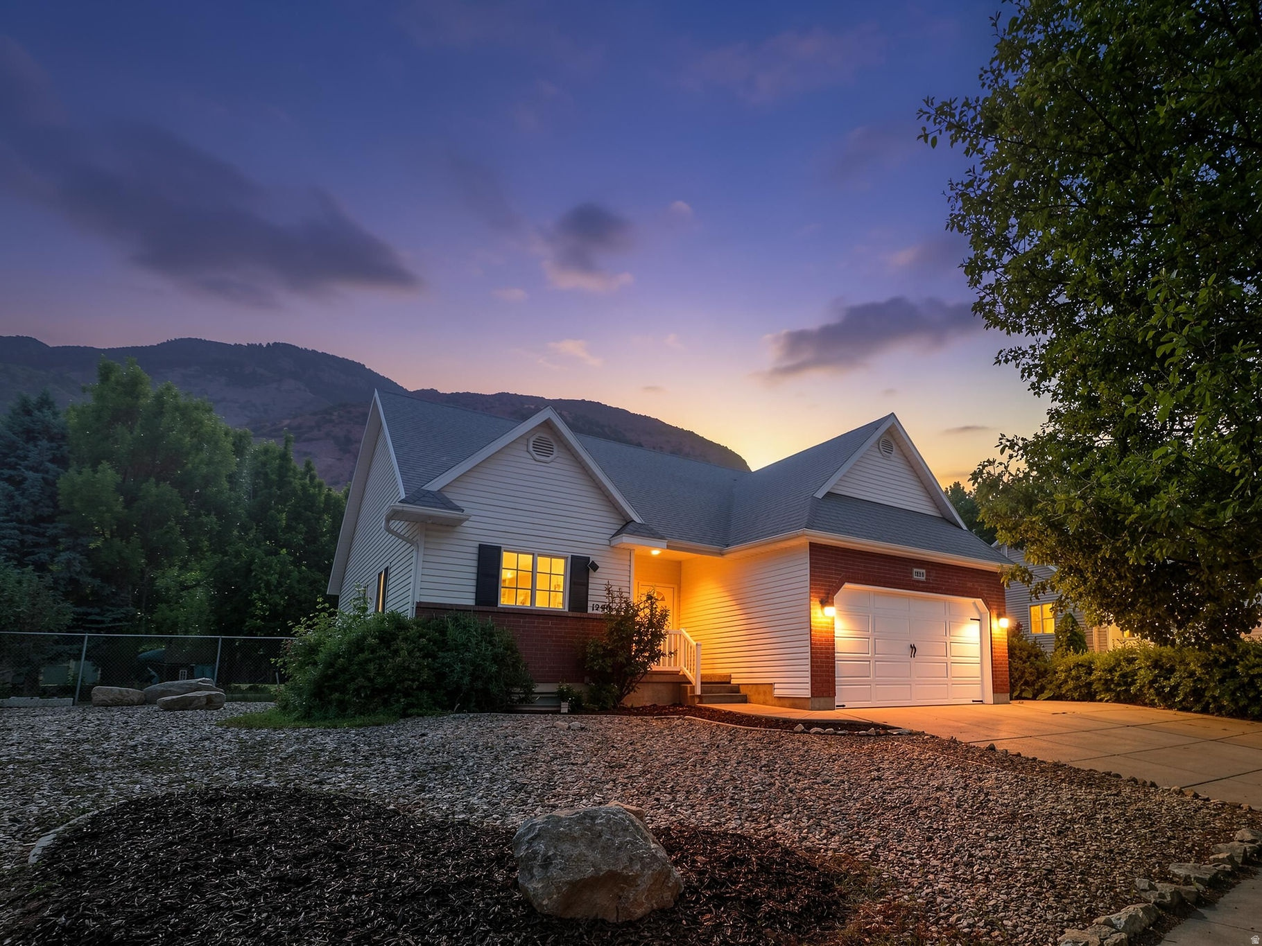 *NEW LISTING* Welcome home to this beautifully updated turnkey rambler with single-level living. West facing front means evening shade to enjoy your park-like fully fenced backyard with mountain views under your covered patio. Inside, the home has been thoughtfully refreshed with newly painted cabinets, granite countertops, updated appliances, new baseboards, new carpet, newer LVP flooring, updated paint, and remodeled upstairs bathrooms with new vanities, light fixtures, tile flooring, both completed less than a year ago. Living room features cozy corner gas-fireplace. Primary bedroom features bay-window, oversized walk-in closet, and a modern bathroom complete with a soaker tub and tiled shower. The sale includes all kitchen appliances including the refrigerator, range, microwave, dishwasher, 2 freezers as well as the washer, dryer, and even the lawnmower are included-making this home truly move-in ready. Major mechanical updates provide added confidence and long-term value, including a brand new high-efficiency furnace and AC system (2025) along with a new water heater (2025). Whether you're looking for a home that feels cared for, a backyard made for gathering, or simply a property where the expensive upgrades are already done, this one checks all the boxes. Ogden is known for all its outdoor adventure as hiking and biking trails are blocks away, 3 Ski Resorts all under 1 hour, as well as Pineview Reservoir, Causey Reservoir, and Willard Bay for summer fun in the sun. Don't miss your opportunity to call this house your own home!!