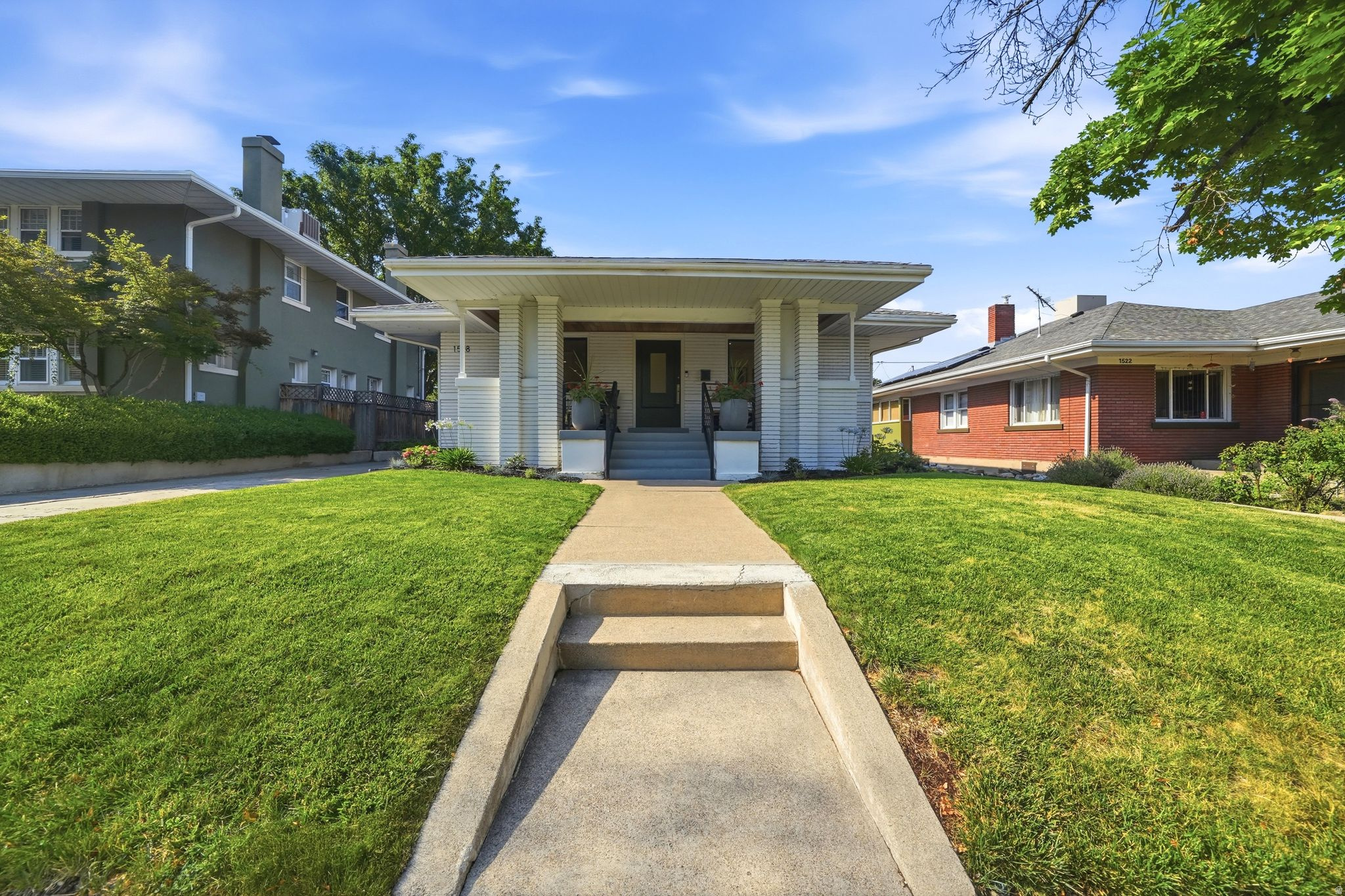 *No showings until after Saturday's Open House* One of Harvard Avenue's finest - a fully renovated 4-bed, 3-bath bungalow on Yalecrest's most distinguished tree-lined street. Updated in 2017 plumbing, electrical, and HVAC, and kitchen with elegant updates throughout including Thermador appliances, waterfall quartz countertops, and hardwood floors throughout. The primary suite has new custom night stands, ceiling fan, lighting and motorized roller shades. Connecting to a spa bathroom and large walk-in closet. The picturesque covered front porch has new Bolivian Walnut tongue and groove ceiling. Out back, a covered patio and private backyard offer a quiet retreat - low maintenance, high reward. Minutes to downtown SLC, University of Utah. Centrally located near 15th & 15th with charming parks and top-rated schools, there are endless reasons that residents love living here. Square footage figures are provided as a courtesy estimate only.  Buyer is advised to obtain an independent measurement.