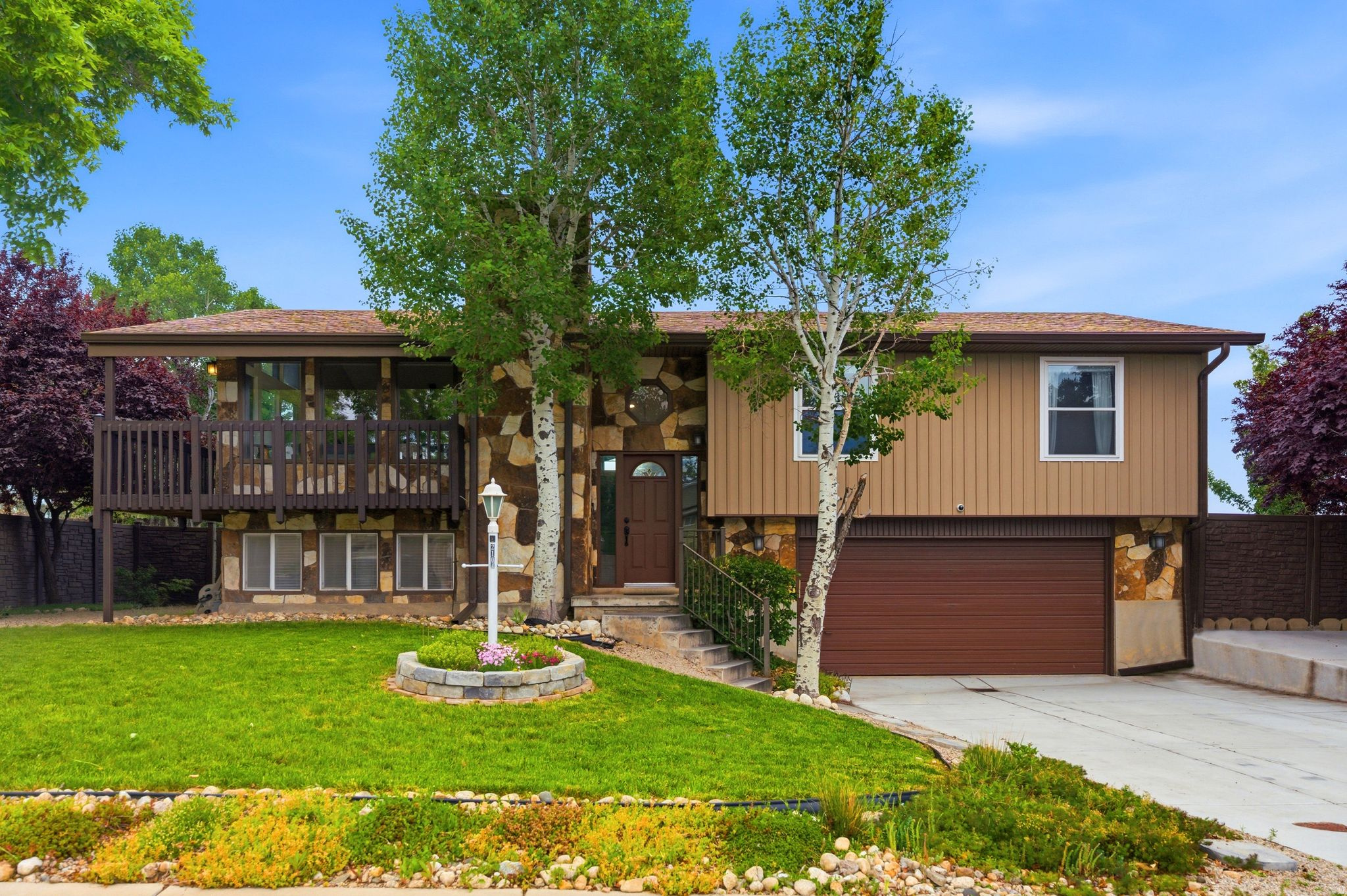 Showings to start at Home Premier on Thursday 5/28 4-7pm. Open House Saturday 5/30 12-2pm. This beautifully updated East Bench home is the kind of place where you can truly tell the sellers thought of everything. Ideally located near world-class skiing, incredible hiking and biking trails, and some of the most highly regarded schools in the state, it offers an amazing lifestyle both inside and out. The open layout is filled with natural light, featuring vaulted ceilings, expansive picture windows, and a stunning remodeled kitchen with quartz countertops, a large island, and plenty of space to gather. The spacious primary suite includes a beautifully updated bath and direct access to the massive deck-perfect for entertaining, summer BBQs, or simply relaxing under the pergola while taking in the incredible views. Outside, you'll find your own private retreat with a covered patio, hot tub, garden boxes, RV parking, and not one but two bonus sheds-ideal for hobbies, crafts, a workshop, or just a little personal escape. With paid-off solar panels for major energy savings and meticulous upkeep throughout-including the roof, soffits, and custom fencing-this home offers peace of mind along with charm. Quietly tucked into a desirable neighborhood, this is the perfect blend of comfort, convenience, and outdoor living.