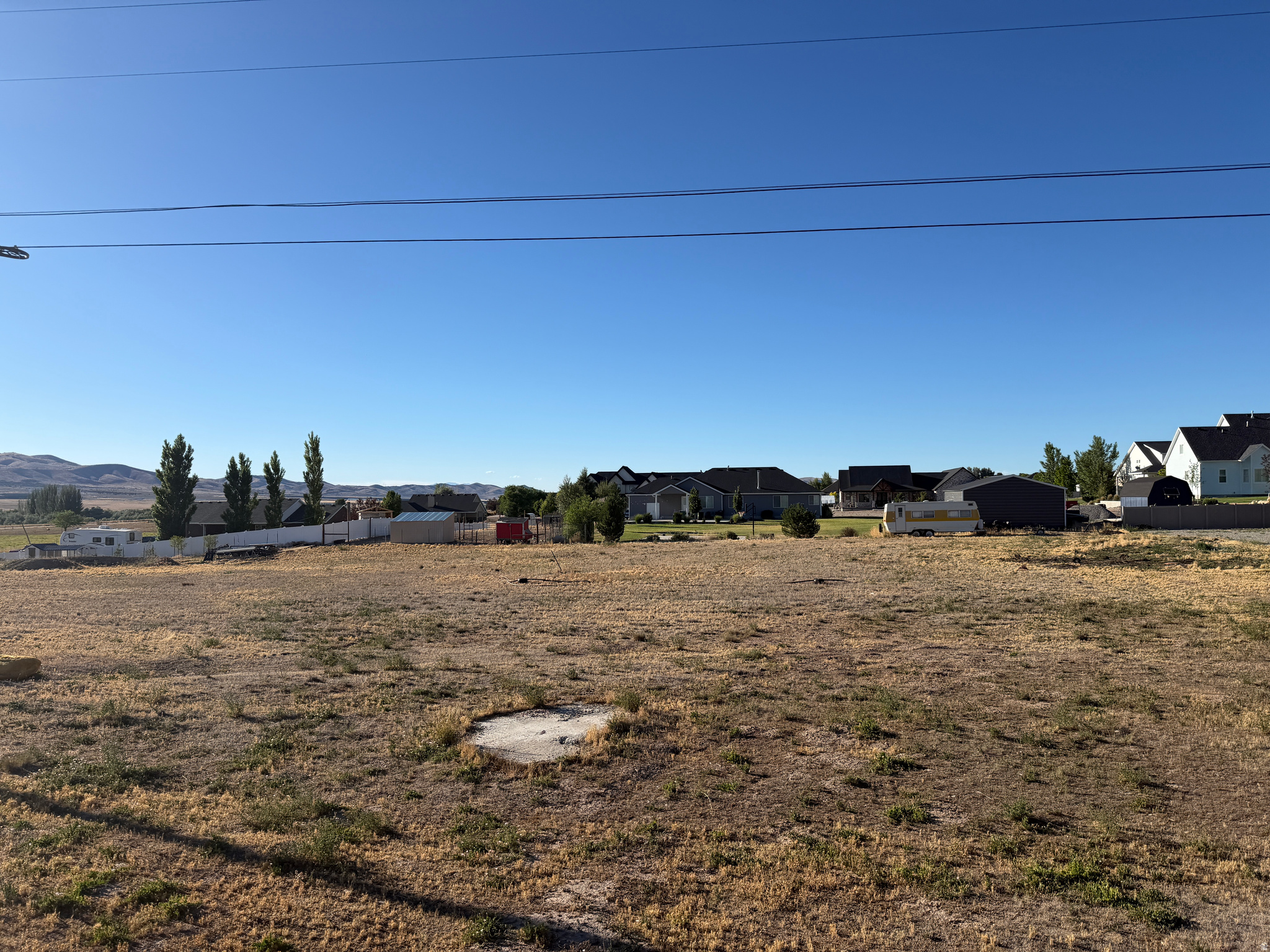 Hard to find buildable lot in Mona. Amazing view, quiet country living. Won't last long! Over an acre on a paved road with South facing frontage. Water source will be from a shared well with the lot owners association and requires a small monthly fee. Gas and power stubbed to the lot as well. Sewer would be septic tank.