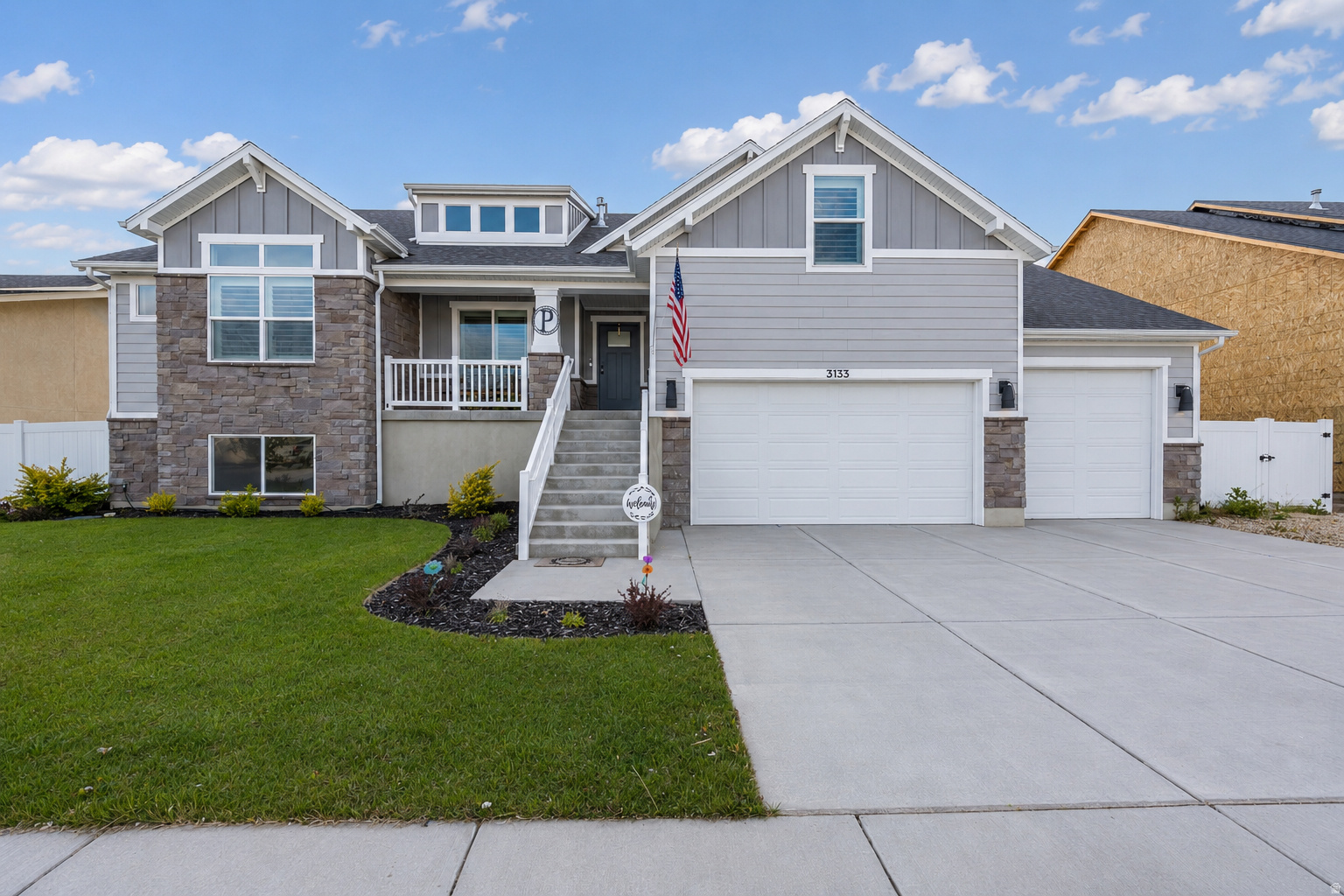 This stunning, nearly new home is truly move-in ready with the hard work already done! Located in the highly desirable Grove at JDC Ranch, this sought-after Monterey floor plan by Nilson Homes features a valuable bonus room addition, ideal for extra living space, a home office, playroom, or potential 4th bedroom. Unlike many new construction options, this home already includes a fully fenced and landscaped backyard along with a newly added concrete patio for immediate enjoyment. Inside, you'll find tasteful finishes throughout, an oversized 3-car garage, and a bright open-concept layout filled with natural light. The spacious great room with cozy fireplace flows seamlessly into the kitchen featuring quartz countertops, abundant cabinetry, a huge pantry, and an oversized island perfect for gathering and entertaining. The unfinished basement offers daylight windows and a separate walkout entrance, creating excellent potential for a future ADU, multi-generational living, or additional living space. Located next to a future neighborhood park and close to schools, parks, and growing Plain City amenities, this home offers the benefits of newer construction without the wait or added expense of completing landscaping and fencing yourself. The Nilson Homes 2/10 warranty is transferable to the new owner.