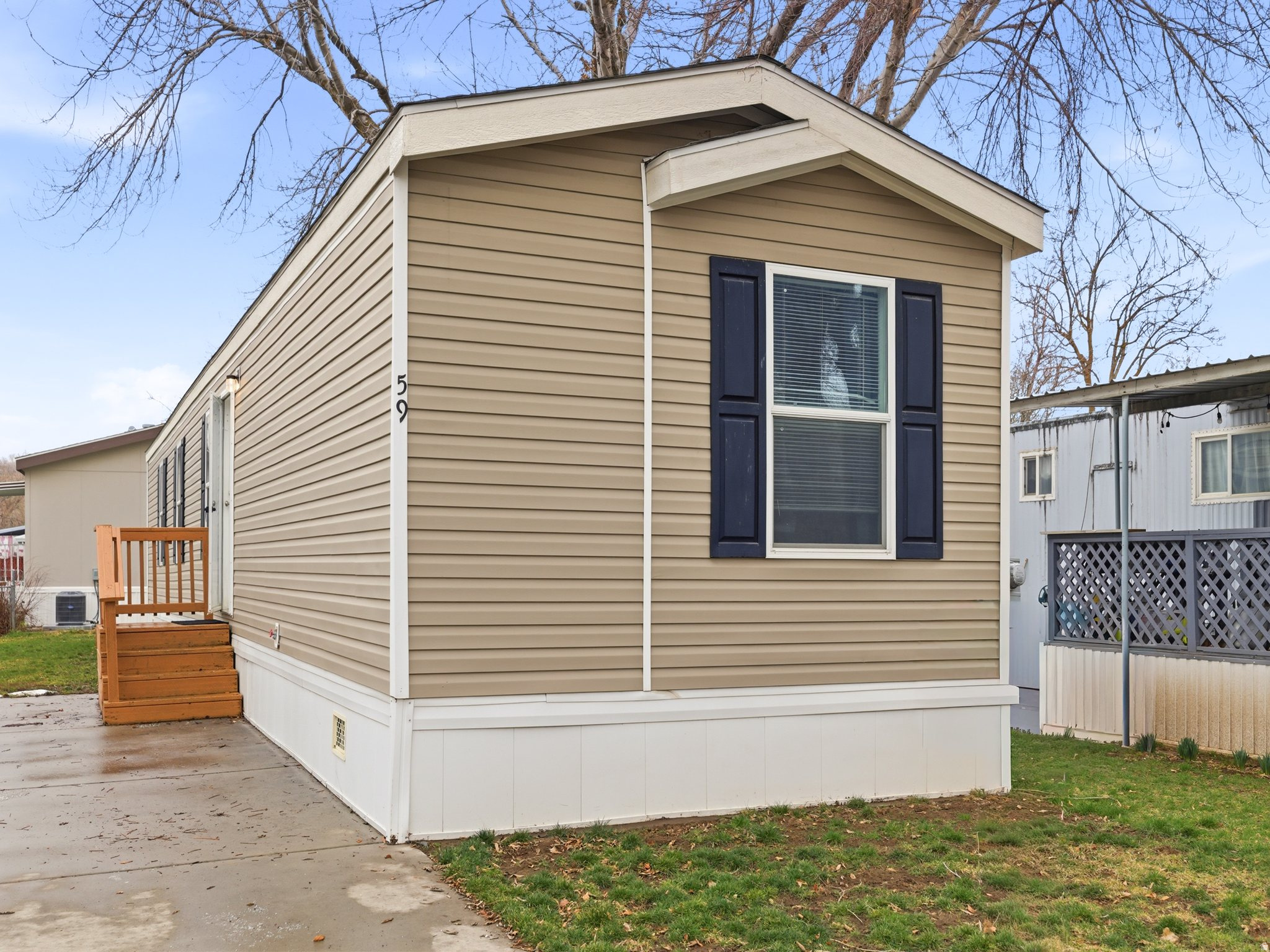 Move-in ready 3-bedroom, 2-bath home located in Riverdale Mobile Home Park. This well-maintained residence features an open-concept living room and kitchen, providing a functional layout for everyday living. Central air conditioning and forced-air heating offer year-round comfort. The primary bedroom includes a private bathroom and a walk-in closet. Refrigerator, washer, and dryer are included in the sale. Conveniently located near shopping centers, restaurants, entertainment, and major freeways for easy commuting. Buyer and buyer's agent to verify all information including square footage. Financing options available; contact listing agent for details.
