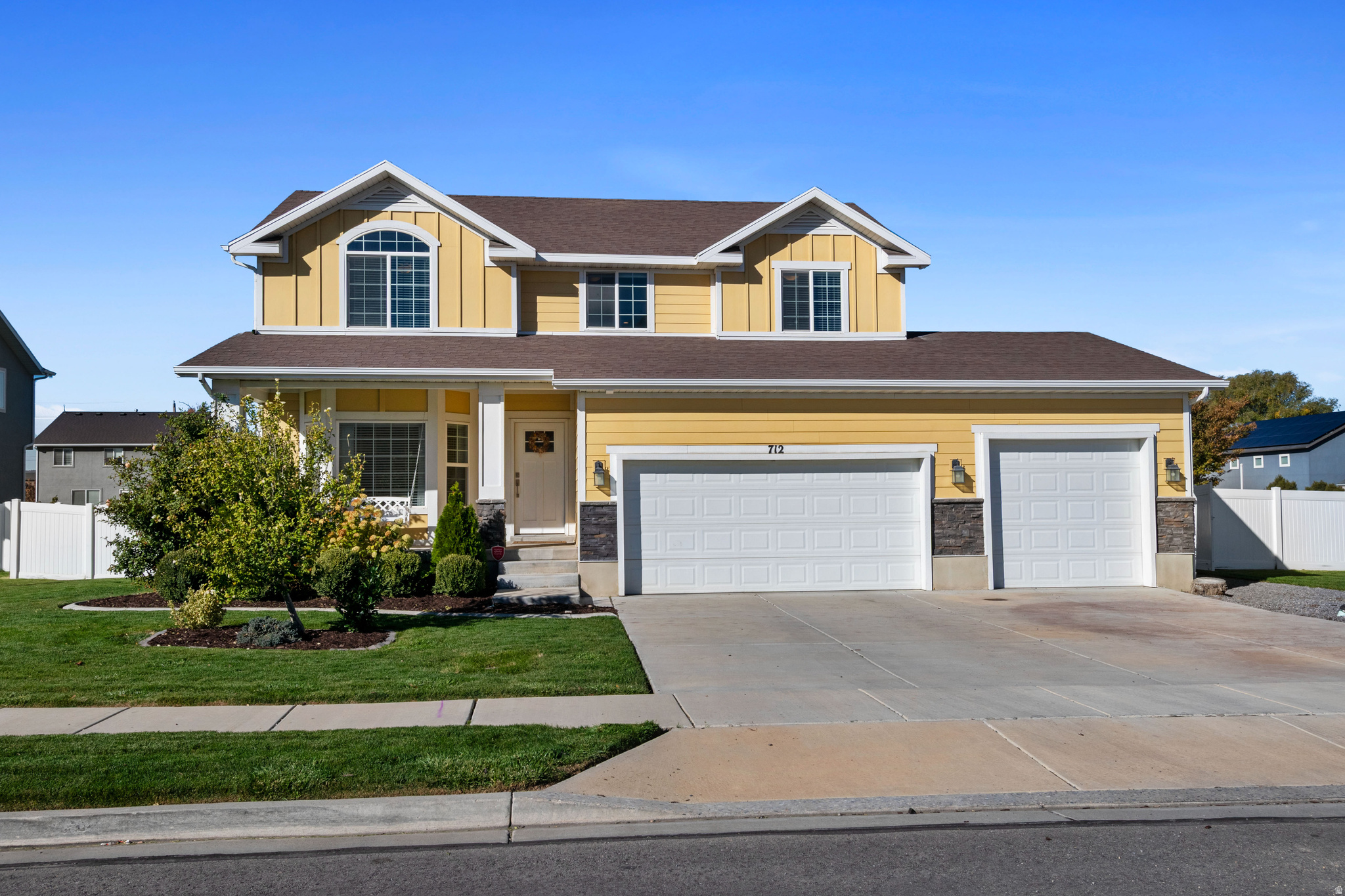 Discover your dream home in a coveted Lehi location! Situated on a corner lot in a peaceful cul-de-sac, this stunning property on a generous 1/3 acre, fully landscaped lot perfectly blends luxury living with immediate income earning potential. The property features an exceptional, fully finished Mother-in-Law/ADU, complete with a separate entrance, full kitchen, full bath, LVT flooring, and its own washer and dryer, providing a turn-key rental opportunity. Inside, the main home is defined by luxury: tall ceilings, beautiful wood floors on the main level, and abundant natural light throughout. The gourmet kitchen and all bathrooms are finished with elegant quartz countertops. The main level also features custom built-in bookshelves in the front room and a welcoming front porch. Retreat to the primary suite, which boasts a spacious walk-in closet and a spa-like bathroom with a double showerhead. Practical amenities include a spacious 3-car garage, a transferable Comcast security system, and available fiber internet. The beautiful lot hosts three mature fruit trees (O'Henry peach, Red Haven peach, and Granny Smith apple). Location is premium: just two blocks from Lehi Sports Complex Park and Snow Springs Elementary, and a quick 10-minute drive to major shopping and entertainment hubs, including Thanksgiving Point, Costco, Walmart, Smiths, and the movie theater.
