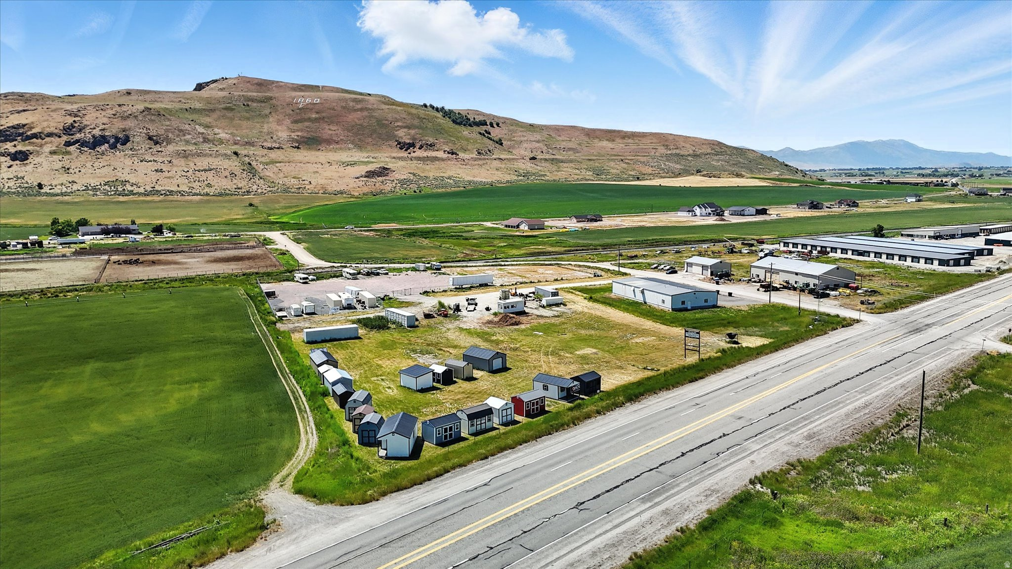 Prime Highway 91 Commercial Lot  Just Outside Franklin Over 2 acres with excellent frontage on Highway 91 (7,200 Average Annual Daily Traffic). Only 30 minutes from Logan. Perfect for business relocation, expansion, or custom development in a growing market. Two separate parcels included (One-1 acre; One-1.02 Acres), Keep one parcel to build on and sell the other, or keep both! Versatility, High visibility, and ready for your build. Call to schedule your showing today!