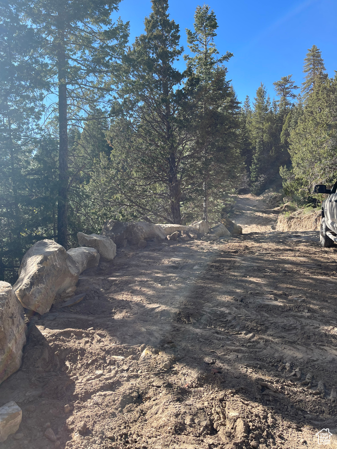 Got views? Now you can have your cake and eat it too! This property is the best of both worlds. 360 degree stunning views but at the same time, complete privacy from any other lot. Your only views from this lot will be of crimson red, pink and yellow hoodoo views of Bryce Canyon and bizarre rock formations, spectacular Pine trees, Quaking Aspens, Cedars and Junipers.  All needed excavations have been completed and are ready for you to build your dream cabin. Best yet, this lot already has power to the pad and much sought after water rights. 1Acre water right will be transferred.   Fiber optics has been pulled to bottom of lot and conduit installed. Just shy of 4 acres with endless possibilities to make this your dream mountain property. This lot backs up to National Forest and is close to Bruce Canyon and Zions National Park.