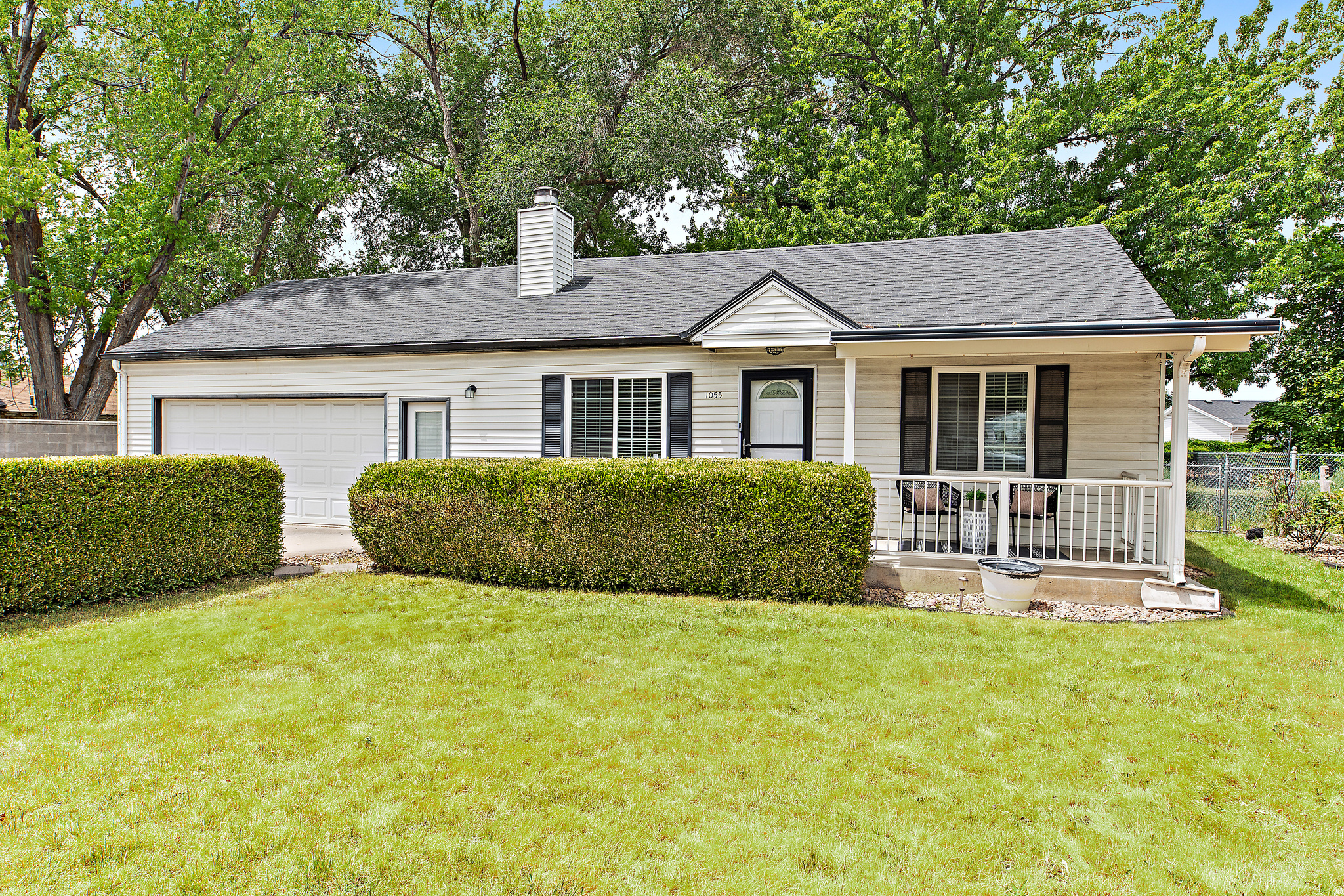 Welcome home to this beautifully remodeled Orem rambler nestled in a quiet, family-friendly neighborhood surrounded by mature trees and established landscaping. Updated in 2026 with new flooring, paint, and fixtures throughout, this home blends modern touches with timeless comfort.  Inside, you'll find spacious rooms, 3 bedrooms, 2 bathrooms, main-level laundry, two cozy fireplaces, and a large family room in the basement-perfect for movie nights, game days, or gathering with family and friends. The kitchen features a gas range with a built-in griddle, refrigerator included, and easy access to the backyard for seamless indoor-outdoor entertaining.  Step outside to the showstopper-a huge deck designed for hosting summer BBQs, family gatherings, and relaxing evenings under the trees. The backyard also features a beautiful pond and fountain, creating a peaceful retreat right at home. Basketball hoop included for outdoor fun, plus two storage sheds offering plenty of space for tools, toys, and equipment.  Storage is abundant throughout the home with a large basement pantry/storage area, additional storage under the stairs, a large chest freezer included in the garage, and plenty of room for all your belongings.  This move-in ready home offers the perfect combination of charm, space, storage, and outdoor enjoyment-all in one of Orem's most desirable established neighborhoods.