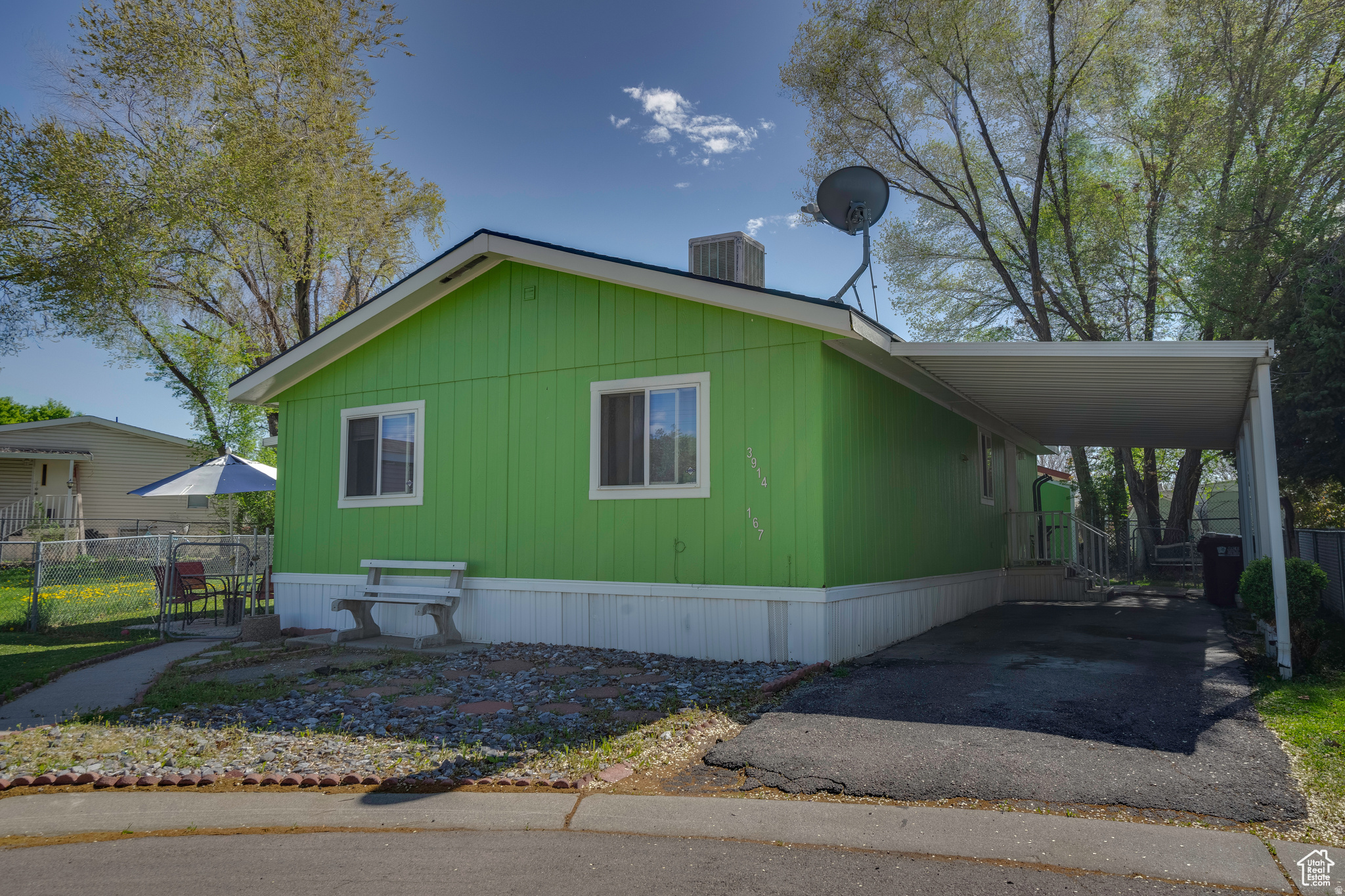 Ready for its next owner! This charming and move-in-ready 3-bedroom, 2-bath double-wide offers a bright, open floorplan perfect for hosting, relaxing, or spreading out. Enjoy peace of mind with recent updates, including full interior paint (2023), a newer roof, and a newer water heater.  Step outside to a spacious, fully fenced yard-ideal for pets, kids, gardening, or weekend BBQs. The community itself is a huge bonus, offering amenities like a gym, splash pad, clubhouse, and pickleball court. Storm water and sewer are covered, and residents report low water bills.  If you've been looking for space, amenities, and a welcoming community, this home is a must-see. Come and check out what makes this one special!