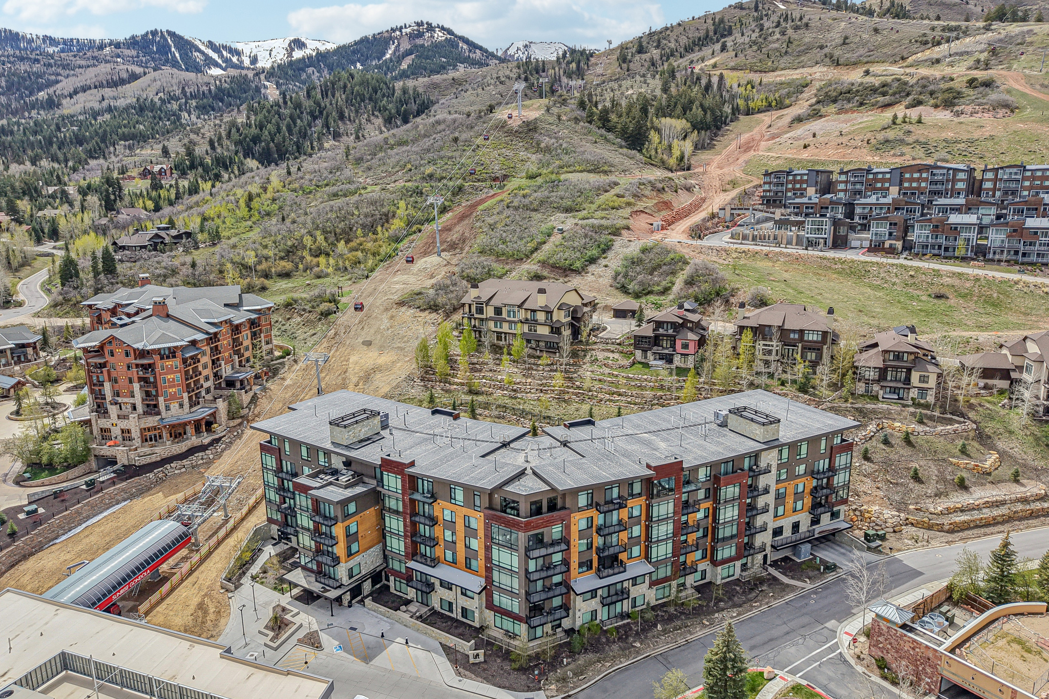 Luxury Ski-In Ski-Out 2BR next to the Newly Installed 10-Person Gondola! Fully furnished, spacious living area, king-size bedrooms, modern bathrooms, extra sofa bed. Valet ski/snowboard locker room, pool, hot tubs, fitness center, cabanas, BBQ stations, video game area, kids room, central lounge. Near Pendry Plaza, downtown Park City, outdoor activities. Perfect for homeowners and investors. Ski-in ski-out access for maximum mountain enjoyment. Rental income potential. Elegant views, serene atmosphere. Easy access to SLC airport. Downtown amenities, outdoor adventures nearby. Don't miss this opportunity for luxury and convenience in a beautiful mountain destination.  The property features a spacious open living room, dining, and kitchen area, perfect for entertaining guests and enjoying charming views. There are two beautifully designed king-size bedrooms that provide ample space and comfort. The two modern bathrooms are equipped with high-end fixtures and finishes. Additionally, there is an extra sofa bed for accommodating extra guests. The residence is thoughtfully furnished and decorated with top-of-the-line furniture and tasteful decor. With ski-in ski-out access, you can effortlessly hit the slopes and maximize your time on the mountain.  The building offers a range of luxurious amenities for residents to enjoy. The fully staffed valet ski/snowboard locker room provides a convenient and secure place to store your gear after an exhilarating day on the mountains. No need to worry about lugging your equipment back to the residence - simply drop it off with the friendly and attentive staff. There is also an inviting pool for relaxing and refreshing after a day of skiing, along with two extravagant hot tubs perfect for soaking and unwinding. Stay in shape at the state-of-the-art fitness center equipped with the latest exercise equipment. The poolside cabanas and BBQ stations are ideal for outdoor gatherings and summer barbecues.