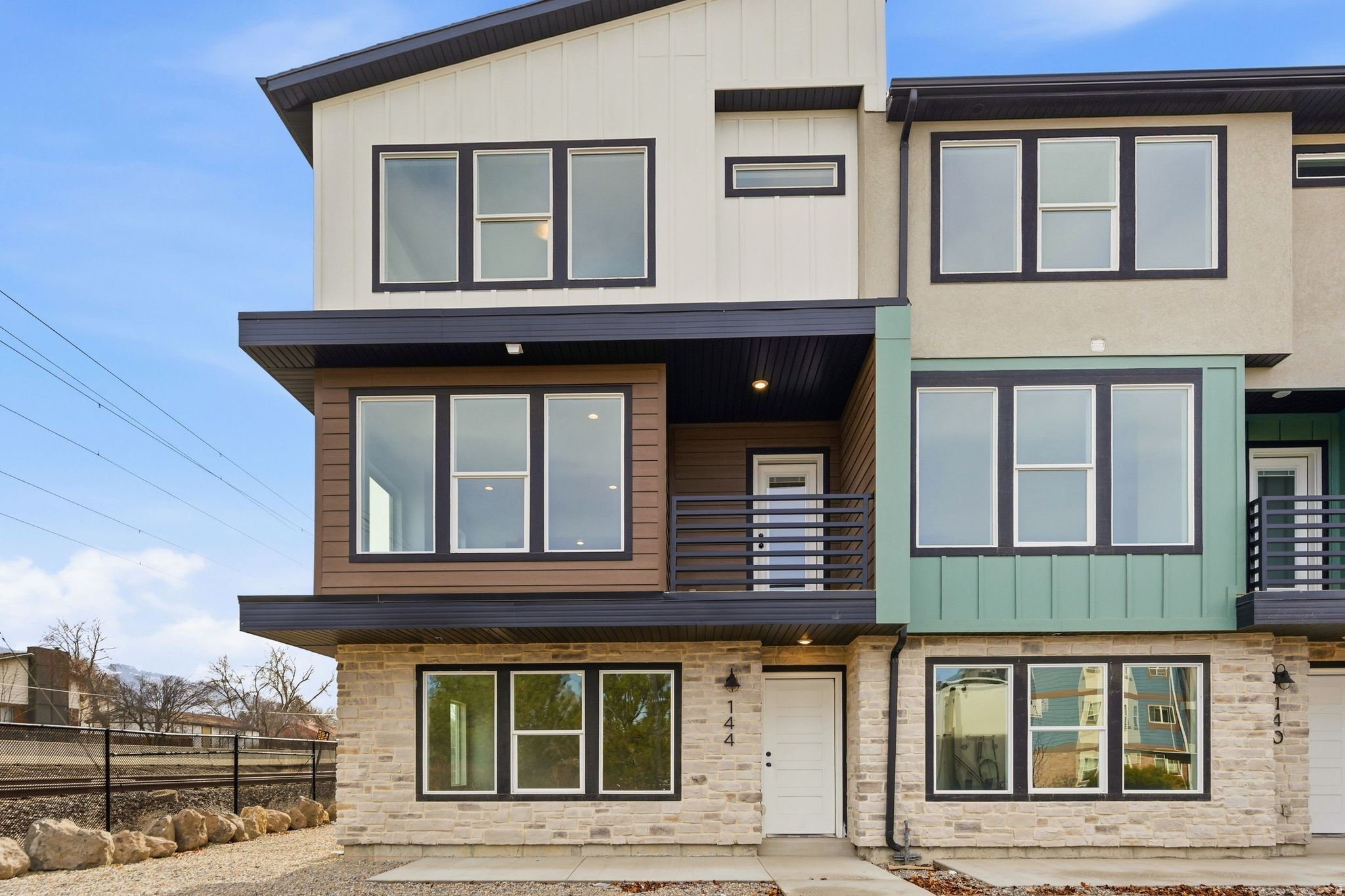 Exciting Opportunity: Final 5 Units Available! Stunning New Construction Townhomes in Sought-After Sandy Location!   Discover the perfect blend of modern living and convenience at five brand-new townhomes nestled in a vibrant neighborhood, just a stone's throw from the bustling heart of Midvale. With easy access to I-15, commuting to Salt Lake City or the surrounding areas becomes a breeze, making it an ideal spot for professionals and families alike. These thoughtfully designed townhomes boast spacious open-concept layouts, filled with natural light and finished with high-quality materials. Enjoy contemporary kitchen designs with stainless steel appliances, elegant countertops, and ample storage, perfect for both everyday living and entertaining. Each unit offers comfortable bedrooms, stylish bathrooms, and a private outdoor space-ideal for relaxing after a long day. This is the last chance to own one of these exceptional townhomes, as they are the final five units remaining in this massive development project. Don't miss out on your opportunity to secure your home in this thriving community! The property features an array of amenities that enhance your lifestyle. Take advantage of the fenced dog park, where your furry friends can play freely, or get active on the pickleball and basketball courts. For those with a green thumb, rentable vegetable boxes are available to cultivate your own garden, fostering a sense of community and sustainable living. Located in a rapidly growing area, you'll find an abundance of shopping, dining, and recreational options nearby. Enjoy the convenience of local grocery stores, trendy cafes, and diverse restaurants just minutes away. For outdoor enthusiasts, the stunning Wasatch Mountains are within easy reach, offering hiking, skiing, and a plethora of year-round activities. Whether you're looking for a new home or a smart investment opportunity, these low-maintenance townhomes combine comfort, style, and an unbeatable location. With these final units available, now is the time to schedule your showing and secure your place in this exciting new community. Don't miss out on the chance to be part of this flourishing neighborhood-act fast before they're gone!