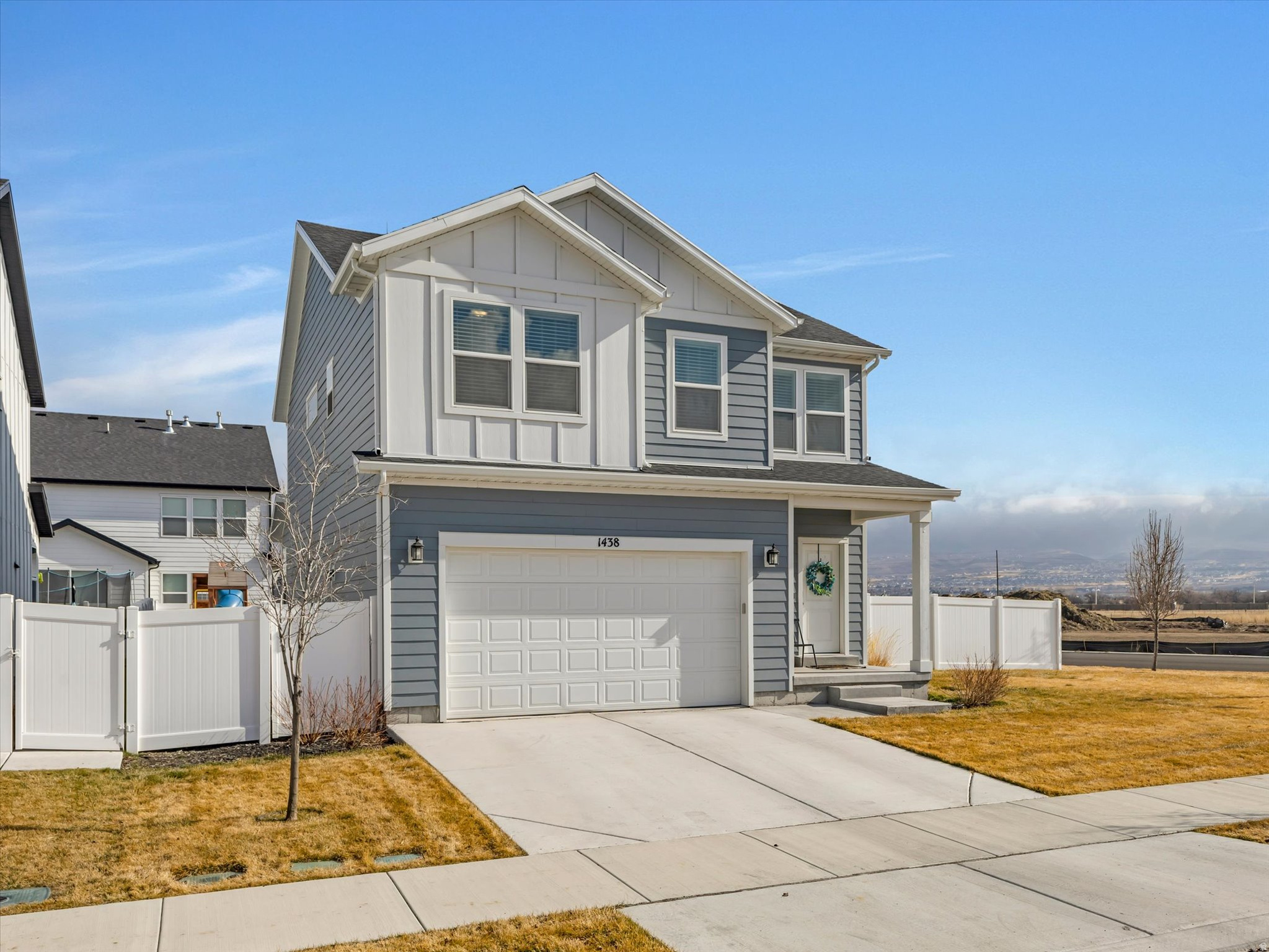 Built in 2022 and designed for easy, everyday living, this 3 bedroom, 2.5 bathroom Payson home offers a clean, modern feel with just the right amount of space. Step inside and you'll notice the natural light across the main floor, paired with dark LVP flooring that grounds the space. The kitchen features gray cabinetry, crisp white countertops, and a modern backsplash that keeps the look clean and current. The layout flows easily from kitchen to living area, making it simple to gather, host, or just settle in for the night. Upstairs, a loft at the top of the stairs adds flexibility you'll actually use. TV lounge, home office, playroom, study space. It's a bonus area that adapts as life shifts and seasons change The primary suite delivers where it counts, with double sinks, an oversized shower, and room to actually breathe at the end of the day. Two additional bedrooms and a full bath round out the upper level with both function and versatility. At 1,930 square feet, the footprint feels intentional and efficient. The corner lot placement gives you a little more space between neighbors than many newer builds, and the two car garage keeps daily life organized. Located with quick access to town and a straightforward commute, this one keeps things simple in all the right ways. Clean lines. Modern finishes. Ready for what's next.