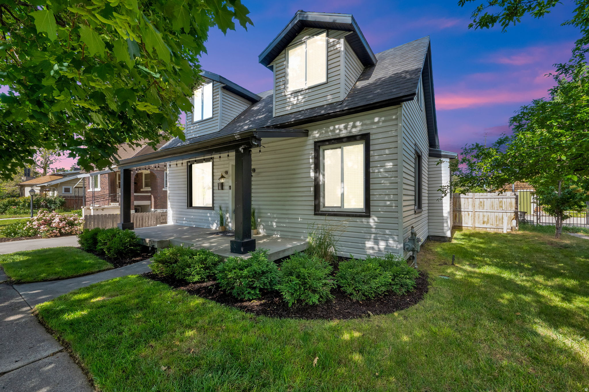 Beautifully Updated Historic Provo Home! Ideally located just minutes from both Brigham Young University and Utah Valley University, this stunning 1913 home perfectly blends timeless character with modern comfort. Thoughtfully renovated from top to bottom, it showcases designer finishes while preserving the unique charm that makes historic homes so special.  The updated kitchen features stainless steel appliances, granite countertops, tile backsplash, and engineered hardwood flooring. Major system upgrades provide peace of mind, including a new A/C, water heater, sewer line, electrical wiring, and breaker panel.  Upstairs, escape to the spacious primary suite complete with an oversized walk-in closet and a private sitting area-perfect for unwinding after a long day. Outside, enjoy a large fully landscaped yard with automatic sprinklers, a massive detached two-car garage, and abundant storage space.  Enjoy the convenience of being close to universities, shopping, dining, parks, and everything downtown Provo has to offer while living in a home full of character and modern functionality. A rare opportunity to own a beautifully restored historic home in one of Provo's most desirable locations.