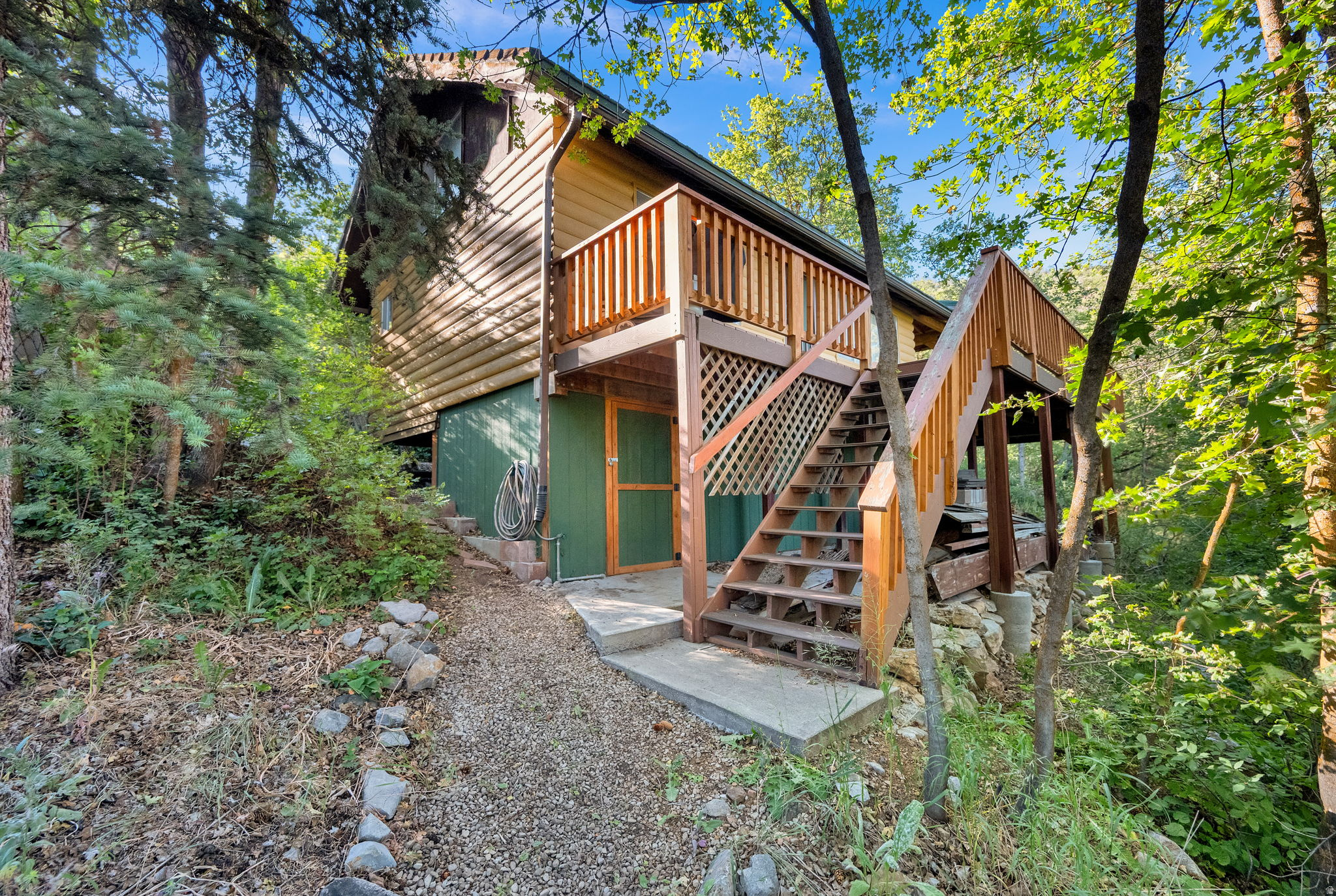 Tucked deep in the whispering pines, this mountain cabin retreat sits on over1.5 acres of pure outdoor freedom, offering the perfect blend of seclusion, recreation, and future potential.  Sell include 2 parcels of land and 20 share of Oak Haven water, the property provides fare flexibility for a build on the second lost and idea for those who want the option to expand with year round living to modify waterline to create a more self-sustaining lifestyle.  Parcel 1:  a charming rustic cabin with wood burning fireplace and cover living spaces.  Parcel 2: a open buildable lot ready for your vision, guest cabin, workshop, garage or maintain as with with recreational space.  There's plenty of room for 12+ vehicles making it perfect for gathering, toys, trailers and all the adventure gear you can imagine.  Whether you are seeking a seasonal family getaway, or a year-round residence this cabin is ready for your personal touch, space to grow, privacy and endless fun for all ages.