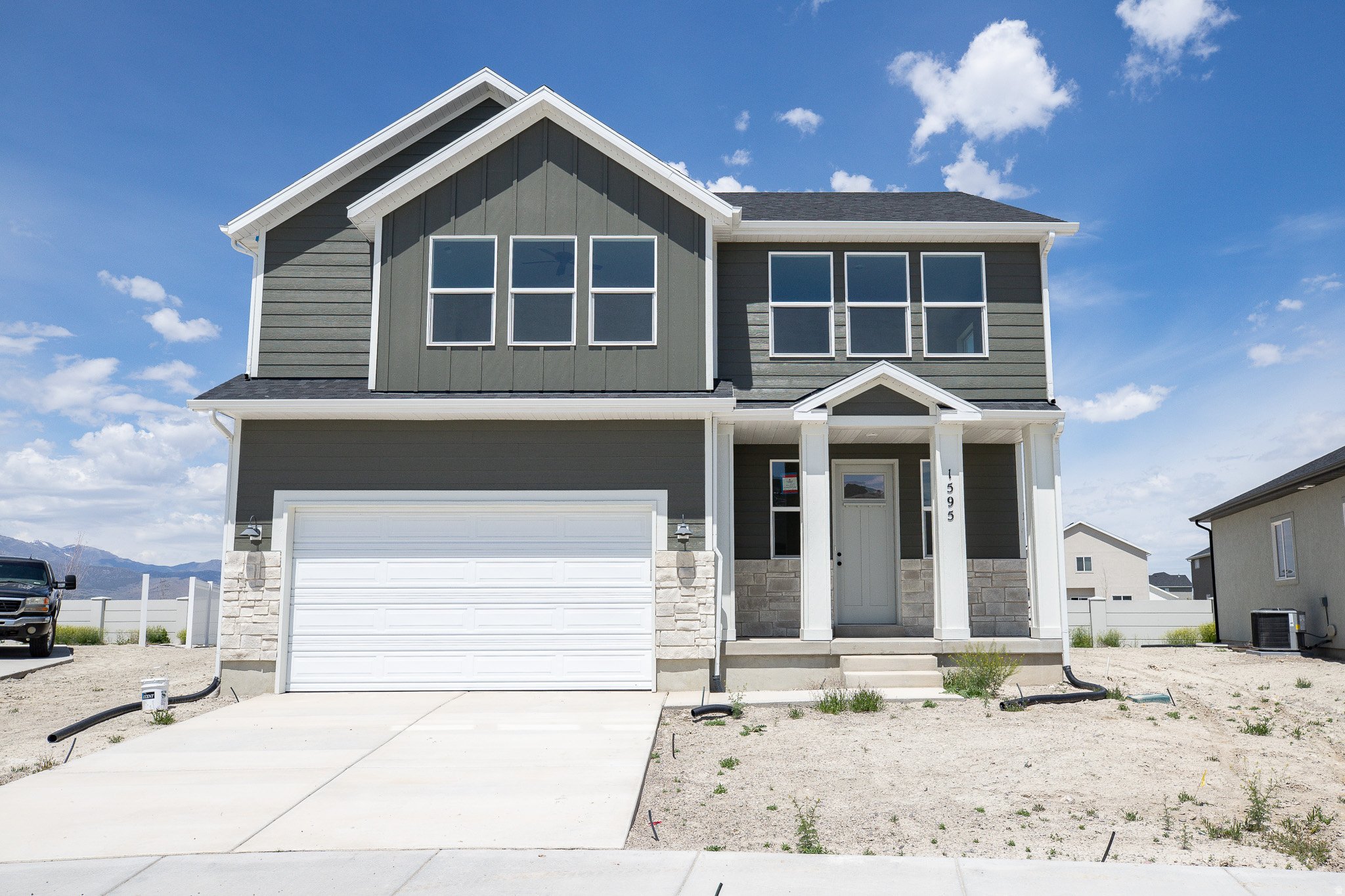 INTEREST RATES STARTING AS LOW AS 4.99% with our preferred lender or AMAZING $20,000 INCENTIVE TOWARDS CLOSING COSTS, RATE BUYDOWN, OR PRICE REDUCTION REGARDLESS OF LENDER! (Talk to agent for conditions). Must-see Parkway Fields Community in Eagle Mountain! Move-in ready! This beautiful home built by Flagship Homes features 4 bedrooms, 2.5 bathrooms, quartz slab countertops, painted cabinets, laminate flooring on the main level, a large loft on the 2nd floor, landscaped front yard, 2 car garage, decorative concrete wall on rear boundary and backyard (can be landscaped for an additional charge). The primary bedroom has a vaulted ceiling, large walk-in closet, and dual sinks with a separate tub and a double shower. With an unfinished basement, this home provides space for storage and room to grow. (If preferred, basement can be finished for an additional charge.) Call for more information or stop by our model home at 1546 E. Starling Lane, Eagle Mountain for a tour. Model home hours: Monday-Saturday 11 AM - 6 PM. Buyers to verify all information. Square footage is from house plans. Show Inst: Call Agent/Appt.