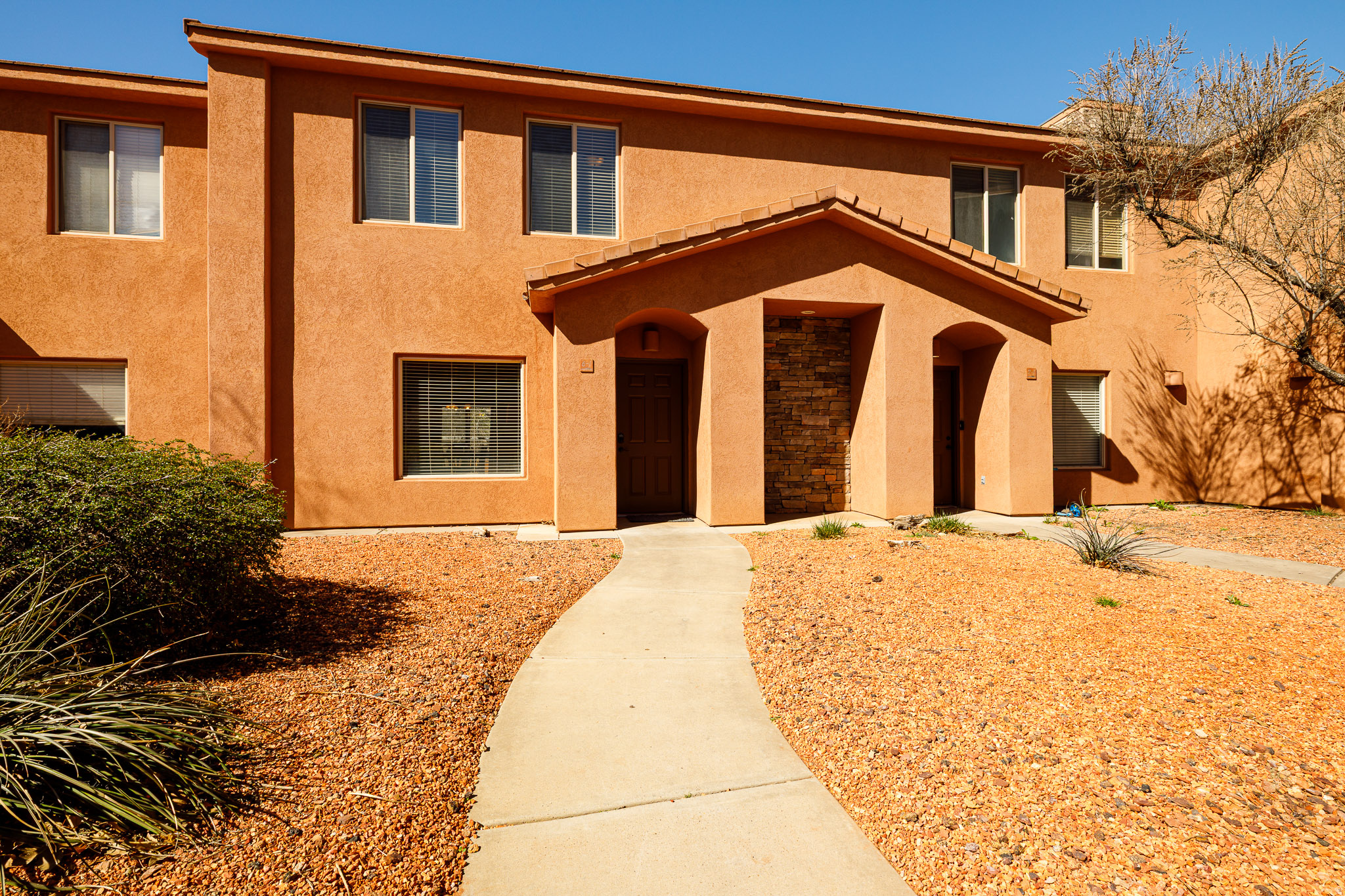 Welcome to this well-maintained 3 bed, 2 bath townhome offering 1,242 sq ft of comfortable living in the heart of Kanab, Utah. Located at 300 E 300 N #I-6, this home offers a great blend of low-maintenance living and scenic beauty, surrounded by stunning red cliffs and all the charm Southern Utah is known for.Inside, you'll find a functional layout with comfortable living spaces and the added bonus of the washer and dryer being included with the sale. Outside, enjoy the convenience of a covered parking spot and access to desirable community amenities including a pool, hot tub, and workout area.Whether you're looking for a full-time residence, second home, or investment opportunity, this townhome offers a great location, beautiful surroundings, and easy living in one of Southern Utah's most picturesque communities.
