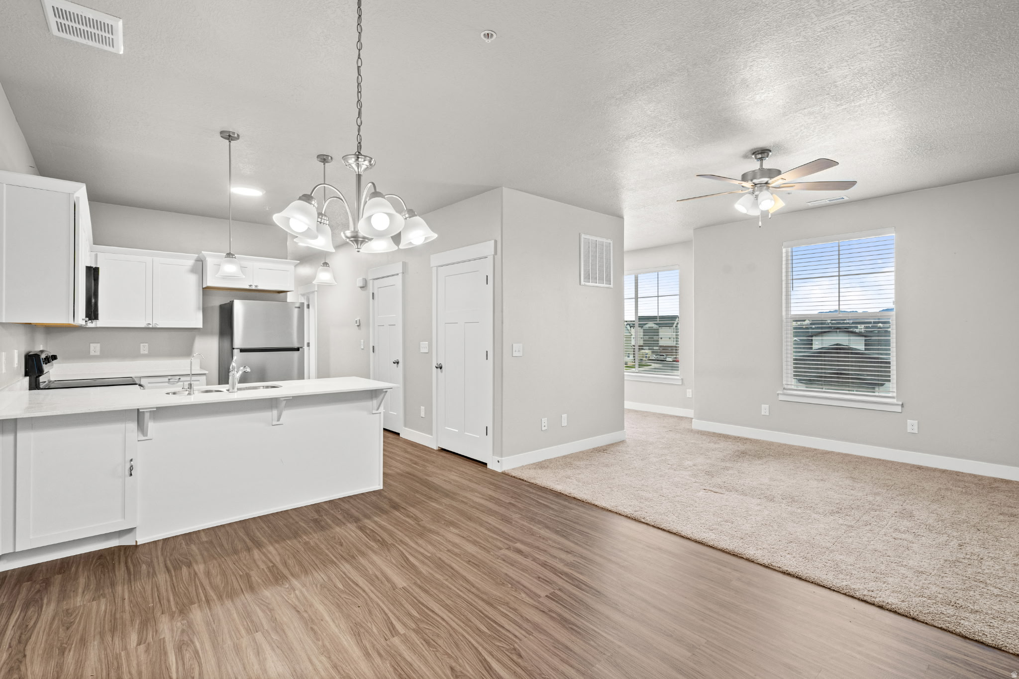 **SPECTACULAR CORNER CONDO  BETTER THAN NEW! MOVE-IN READY!** Don't miss this **rare opportunity** to own an affordable **second-floor corner condo** in one of the community's best locations! Enjoy extra privacy, additional living space, and breathtaking views of the mountains and Utah Lake-all while being just steps away from the **playground, clubhouse, pool, and basketball court.** This thoughtfully designed home offers **more square footage than most comparable units**, providing **two versatile bonus spaces** that are perfect for a home office, hobby room, game room, or study area. **Upgrades and included features:** * **New water softener** (approximately an **$7,000 value**) * New kitchen appliances * Refrigerator included * Window blinds included * Whole-house water filtration system * Bright, open floor plan with a warm and inviting atmosphere * Incredible mountain and Utah Lake views The current owner purchased this premium unit but later relocated to Salt Lake for work, creating an exceptional opportunity for the next owner. **100% financing may be available for qualified buyers.**   **Vacant and easy to show-schedule anytime!** Square footage figures are provided as a courtesy estimate only and are based on County Records. Buyers are advised to obtain an independent measurement.