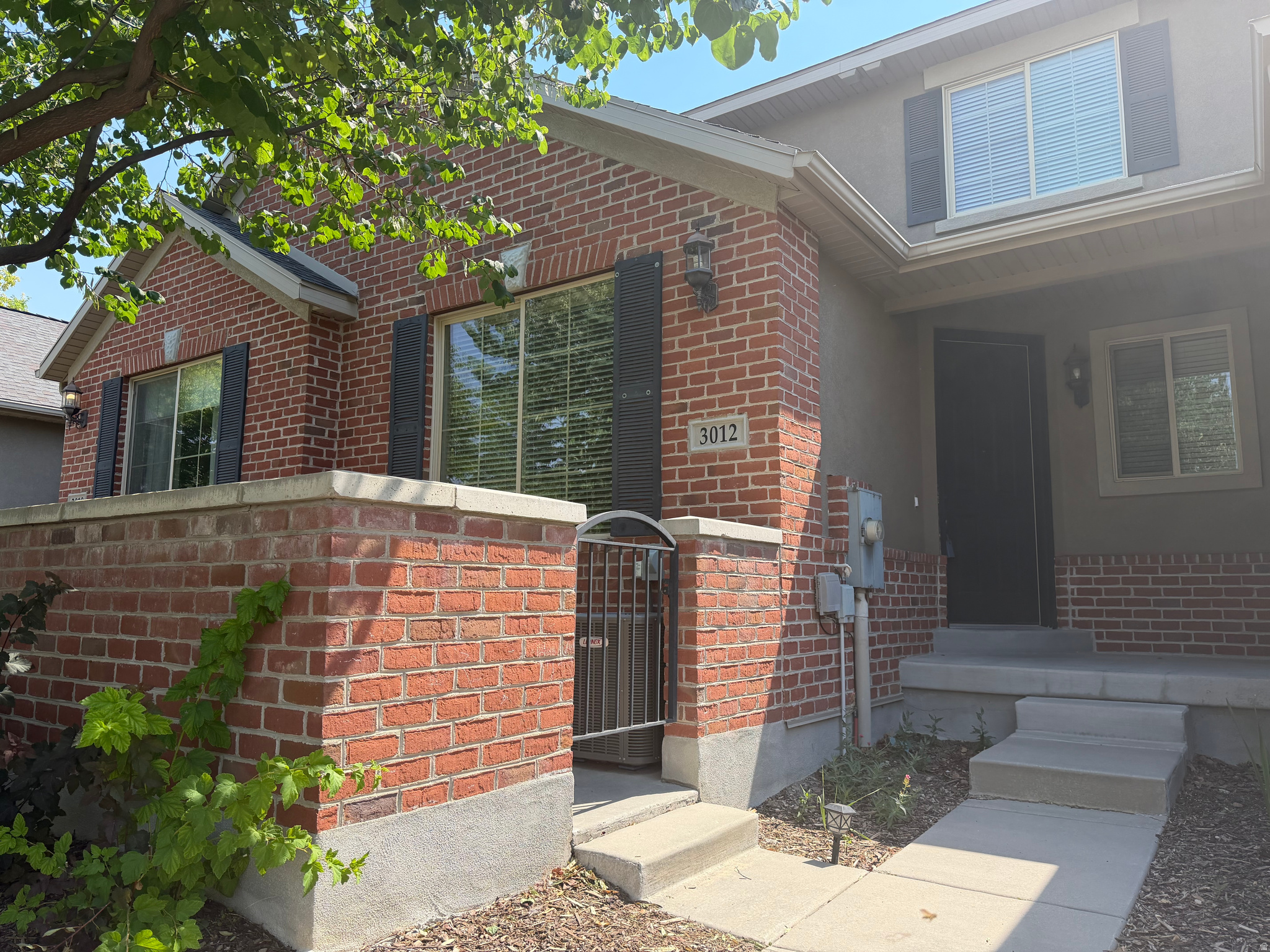 Beautiful move-in-ready 4-bedroom, 3.5-bath townhome in a quiet and desirable West Valley City community! This well-maintained home features a spacious, functional floor plan with a welcoming living area, spacious kitchen, and beautiful hardwood flooring throughout the main level. Upstairs, you'll find a private primary suite with an ensuite full bathroom, plus two additional bedrooms and another full bath; ceramic tile flooring adds durability and style to the bedrooms areas The fully finished basement offers an additional bedroom, full bathroom, and flexible space perfect for a home office, media room, or guest retreat. . Major updates include a furnace and central A/C system less than three years old. Enjoy low-maintenance living with HOA amenities and a convenient location near shopping, dining, parks, schools, and freeway access. Don't miss this fantastic opportunity!