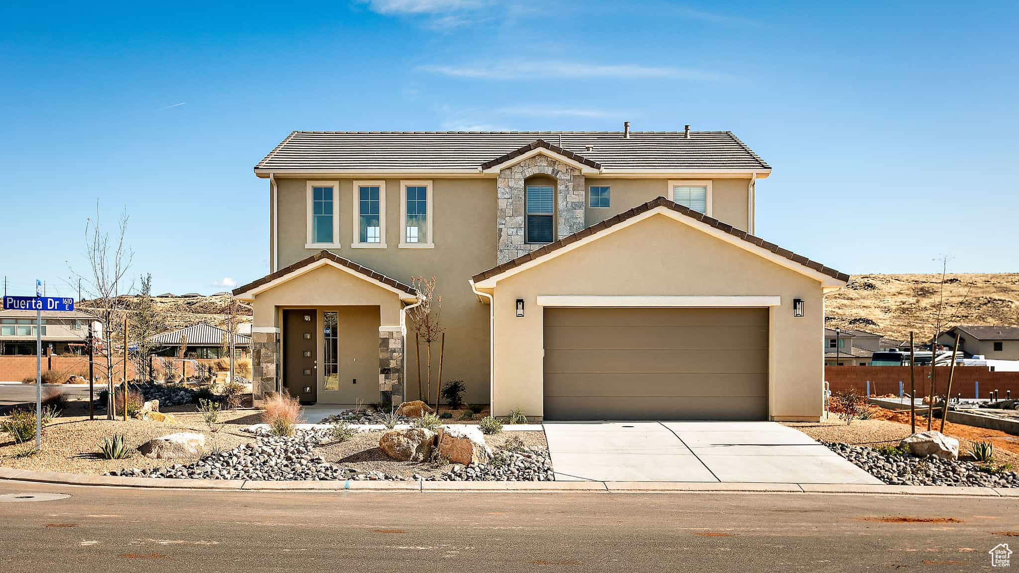 NEW LISTING PRICED $615,000 Turn Key Nightly Rental Professionally Designed. Sold Fully Furnished. Prime Investment.  Home has High End Finishes .  Choose Nightly Rental or Your Fun Filled Southern Utah Retreat. Ladera Pool & Spa is only a few houses away. Close  is Siennna Hills Park. Parking for Guests, Boats & Trailers. Main Floor Master Suite&Open King Size Bed & Luxury Ensuite Top of the stairs  is a bonus space which can also be Extra  Bed  Top Floor has 3 bedrooms .  1 bedroom has  a Queen Bed & 2 Bedrooms have  bunk beds.  The yard is professionally Landscaped with native plants.  This home sits on a premium corner lot that includes a covered patio & grill. The front porch is set back & roomy.  Easy access to so much . Parks, Zions, Snow Canyon, Sand Hollow, Jelly stone, Airport, Golf, Dining Theater, Restaurants.  Make An Offer.