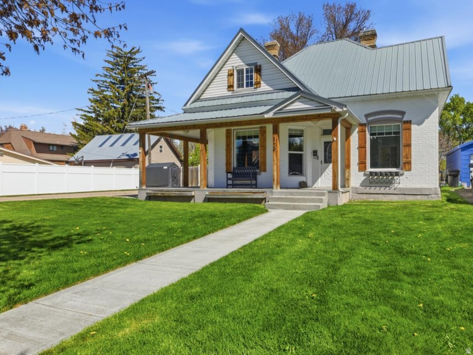 Don't miss this exceptional opportunity! This beautifully updated 5-bedroom, 3-bathroom home blends the timeless charm of a classic property with the comfort and style of modern upgrades. From the moment you arrive, the inviting curb appeal sets the tone for what's inside. Enjoy a spacious, fully fenced yard with mature trees that provide shade and a serene setting. The wraparound front porch is perfect for relaxing summer evenings, while the backyard features a large patio area ideal for entertaining. Thoughtfully renovated and move-in ready, this home offers the perfect balance of character and functionality-come see all it has to offer!