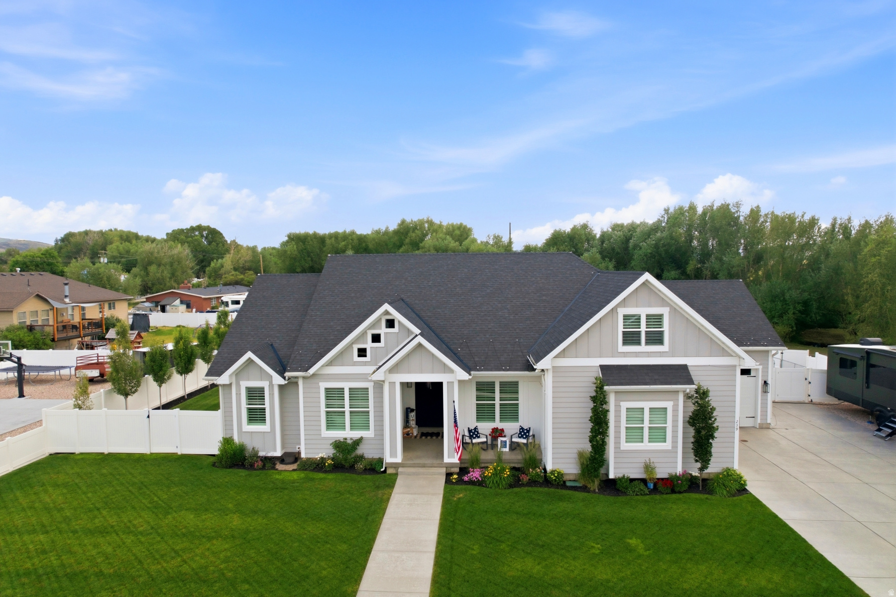 Rare .88-acre horse property in Kamas with a year-round creek, basketball court, RV parking with cleanout, greenhouse, garden beds, and fenced yard. Built in 2016, this 5-bed, 3-bath home offers 3,217 sq ft, a bright custom kitchen with white cabinetry, granite counters, and a large island. Enjoy a primary suite with walk-in closet and stone soaking tub, plus a covered patio, outdoor fireplace, and powered studio/shed.  Add Robert Struwe on all offer. Buyer can purchase Beaven Creek Shares for addtional water.  Add in addendum Parcel ID KW-II-B Dist 04 2 Wetlands Parcel B Kamas West Phase 2 Lot .20 Acre included in sale.  Exclustions: Dog run, garden shed, outdoor platic shed, Garden/deck swing, hammocks, flag pole, washer/dryer/fridge