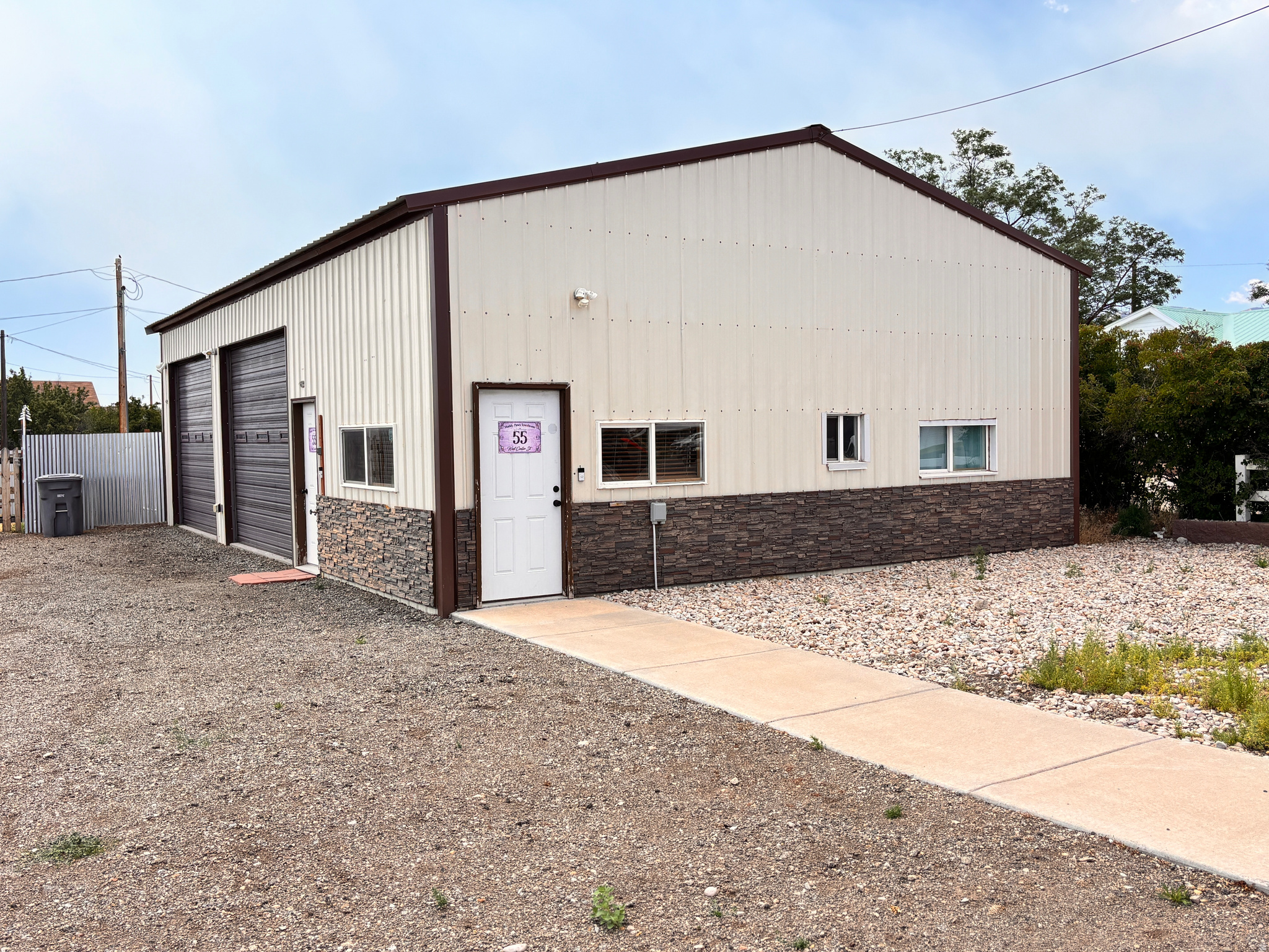 This downtown Monticello barndominium checks all the boxes. Featuring a huge bay/shop area and an exceptionally efficient, well-insulated living space, the property is commercially zoned and currently occupied by a long-term corporate tenant paying $2,400/month. Tenant would love to remain, providing instant cash flow, while owner-occupants have the option to terminate the lease. All furnishings are included. Walk to downtown amenities, enjoy easy access to the mountains, and take advantage of countless recreational opportunities nearby. Buy it as an investment, make it your primary residence, or enjoy it as a turnkey second home getaway from the summer heat.