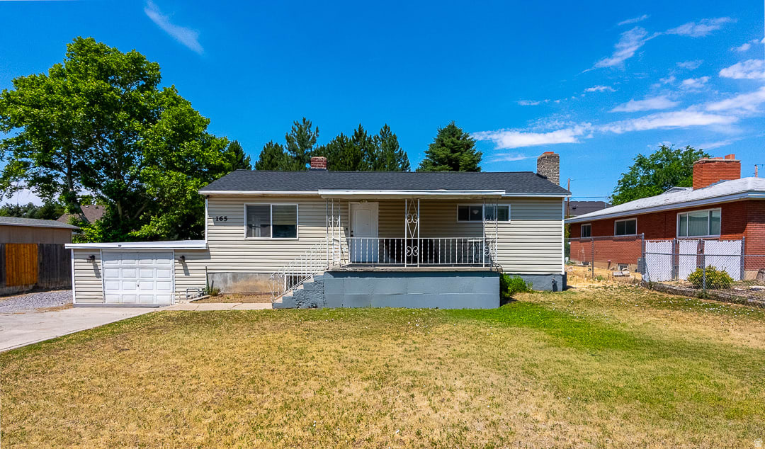 Located directly across from Cascade Elementary, this East Orem home features 4 beds / 2 baths, including 2 bedrooms and 1 bathroom on the main level and a mother-in-law apartment with 2 bedrooms and 1 bath in the basement. Highlights include a massive 4-car garage/shop, mature landscaping, and easy access to Provo Canyon, shopping, dining, BYU, UVU, and major commuter routes. A rare opportunity in one of Orem's most sought-after neighborhoods-you won't find another single-family home in this prime location with a good-sized lot, MIL apartment, and huge 4-car garage/shop. Buyer to verify all information. Square footage figures are provided as a courtesy estimate only and were obtained from County Records .  Buyer is advised to obtain an independent measurement.