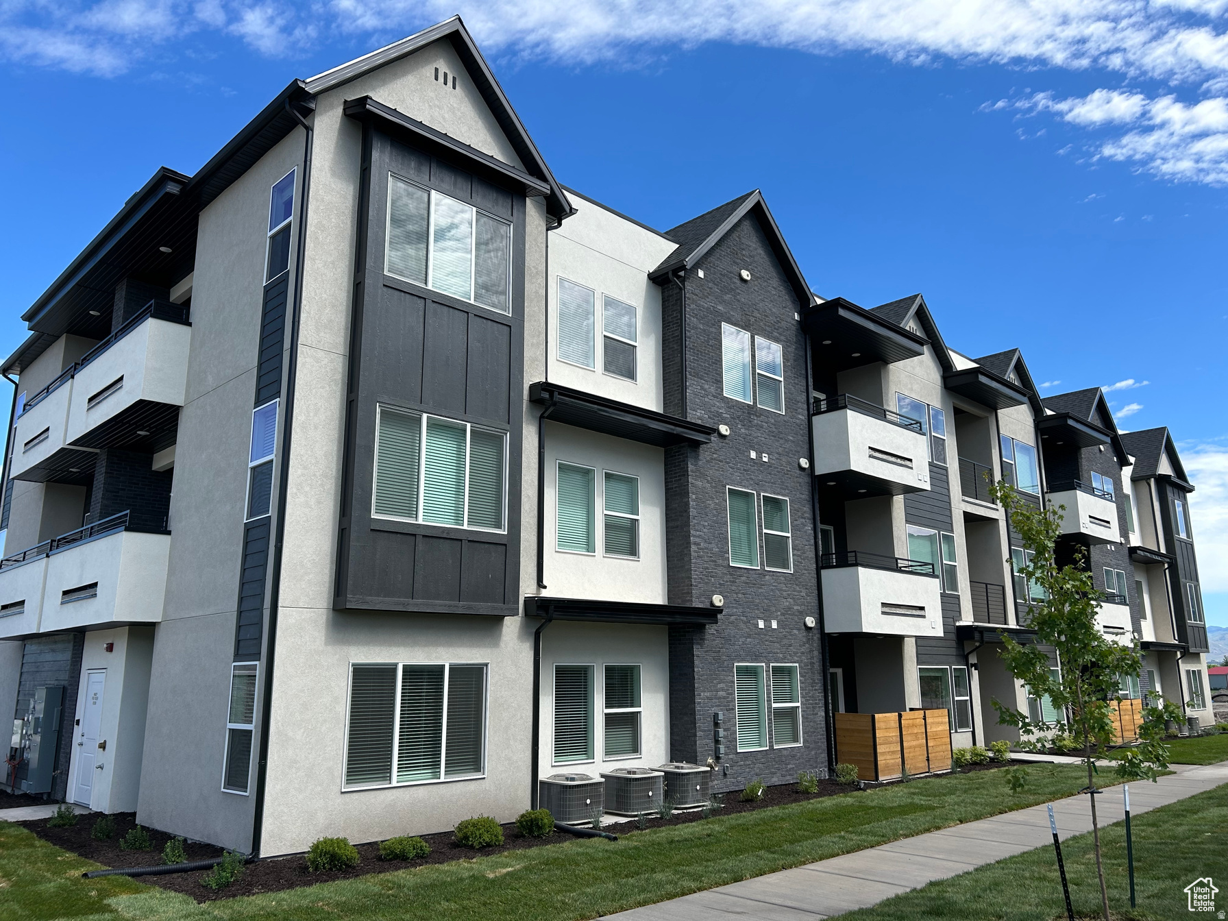 This inviting second-floor condo in Nibley, Utah offers a comfortable and spacious layout with 3 bedrooms and 2 bathrooms. The open-concept design seamlessly connects the kitchen, living room, and dining area, creating a bright and welcoming space perfect for everyday living or hosting guests. Enjoy two private balconies that showcase stunning mountain views, providing the ideal spots to relax, unwind, or take in the beautiful Utah scenery. The well-designed kitchen offers plenty of counter space and storage, while the airy living areas provide flexibility for your lifestyle. With its thoughtful layout, natural light, and scenic surroundings, this condo blends convenience with peaceful living-an excellent place to call home.