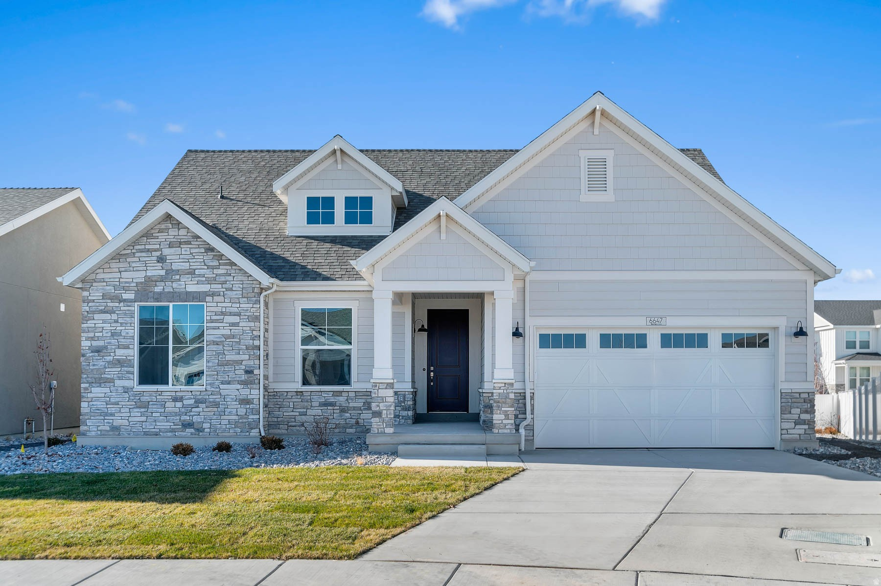 This stunning Big Cottonwood home showcases thoughtful design and modern comfort throughout. The open kitchen is equipped with sleek quartz countertops, platinum gas appliances, and spacious cabinetry-perfect for cooking and gathering. The home features a blend of laminate hardwood, tile, and carpet flooring, enhanced by Craftsman base and casing, 2-tone paint, and a warm gas log fireplace in the great room. Enjoy added convenience with can lighting, Christmas light outlets, a tankless water heater, and multiple energy-efficient upgrades. An expanded patio creates the ideal outdoor space for relaxation and entertaining. The staircase is highlighted with wood railing, while the owner's suite includes cultured marble shower surrounds and sophisticated satin & brushed nickel hardware. A beautifully finished home offering comfort, efficiency, and timeless style in a great community!