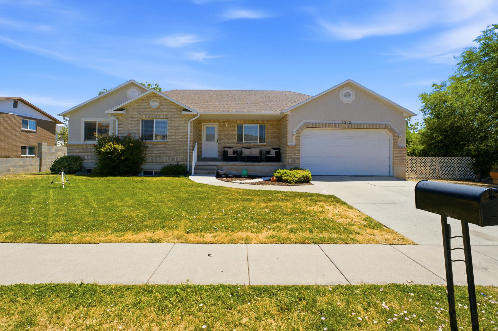 Beautiful rambler offering over 3,100 sq ft on a 0.23-acre lot with RV parking and room to grow! This well-maintained home features 3 bedrooms, 2 bathrooms, vaulted ceilings, and an open, inviting floor plan filled with natural light. The spacious primary suite includes a separate tub and shower. The unfinished basement provides over 1,500 sq ft of future potential, ready for additional bedrooms, a large family room, home theater, gym, office, or extra storage. Major mechanical updates have already been completed with a new furnace, central A/C, and water heater installed in 2025. Fully fenced backyard, welcoming front porch, oversized driveway, 2-car garage, and gravel RV parking. Conveniently located near schools, parks, shopping, dining, and commuter routes, this move-in-ready home offers the perfect combination of comfortable main-level living and exceptional future potential.