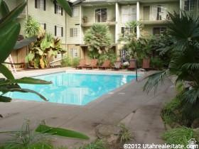 Top Floor Condo Overlooking Pool!  So much space for the money!  City zoned for 4 singles or a family.  Fully rented through August 2026. AS OF NOW THE CONTRACTS ARE OPEN FOR THE UPCOMING SCHOOL YEAR.   SO YOU CAN CHOOSE WHO YOU WANT TO RENT TO, AND WHAT PRICING YOU WANT TO DO.  THIS COULD CHANGE AT ANY TIME.  Large rooms with every bedroom having their own half bath and sharing a shower with one other room.  Perfect for students!  Easy access to both UVU and BYU with a UTA bus stop right out front each hour for both schools.  Plus the free BYU ride shuttle stop just a block away!  HOA has 3 swimming pools including one in a year round tropical solarium with gazebo and beach sand volleyball!  Great numbers as an investment or place your own kids in.  Don't miss out your chance to own one here, they don't come up too often!  check out the photos on the MLS.  24 hours notice to show.