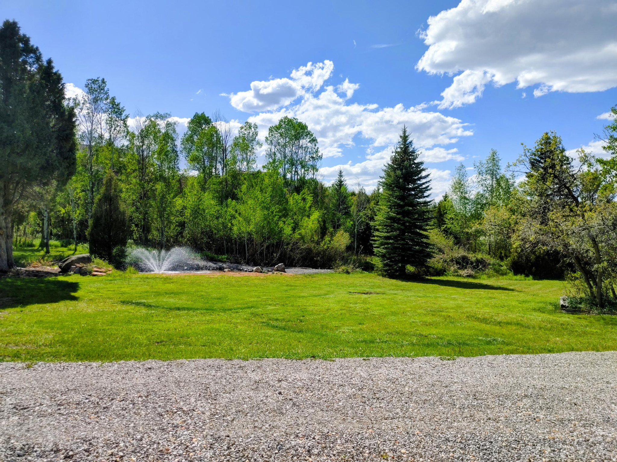 5.54 acres of extreme privacy with water, mature trees, acres of flat grass, year-round stream, utilities, driveways, atv trails, and a large shop for all your toys. This property has the ability to be used as your home away from home right now for camping/RV's with power, water, propane, and septic already installed. It also has the ability to build up to a 9 bedroom dream home whenever you decide you are done using it as a campsite and are ready to demo the old home currently on the property. This property will be envied by all your family and friends coming to visit as it's like having your own private park and KOA all in one with year-round access on highly maintained roads only 15 minutes from Heber City. Use this as your launch pad for all your adventures Wasatch County has to offer including snowmobiling right from your front door with private access to thousands of acres of National Forest.