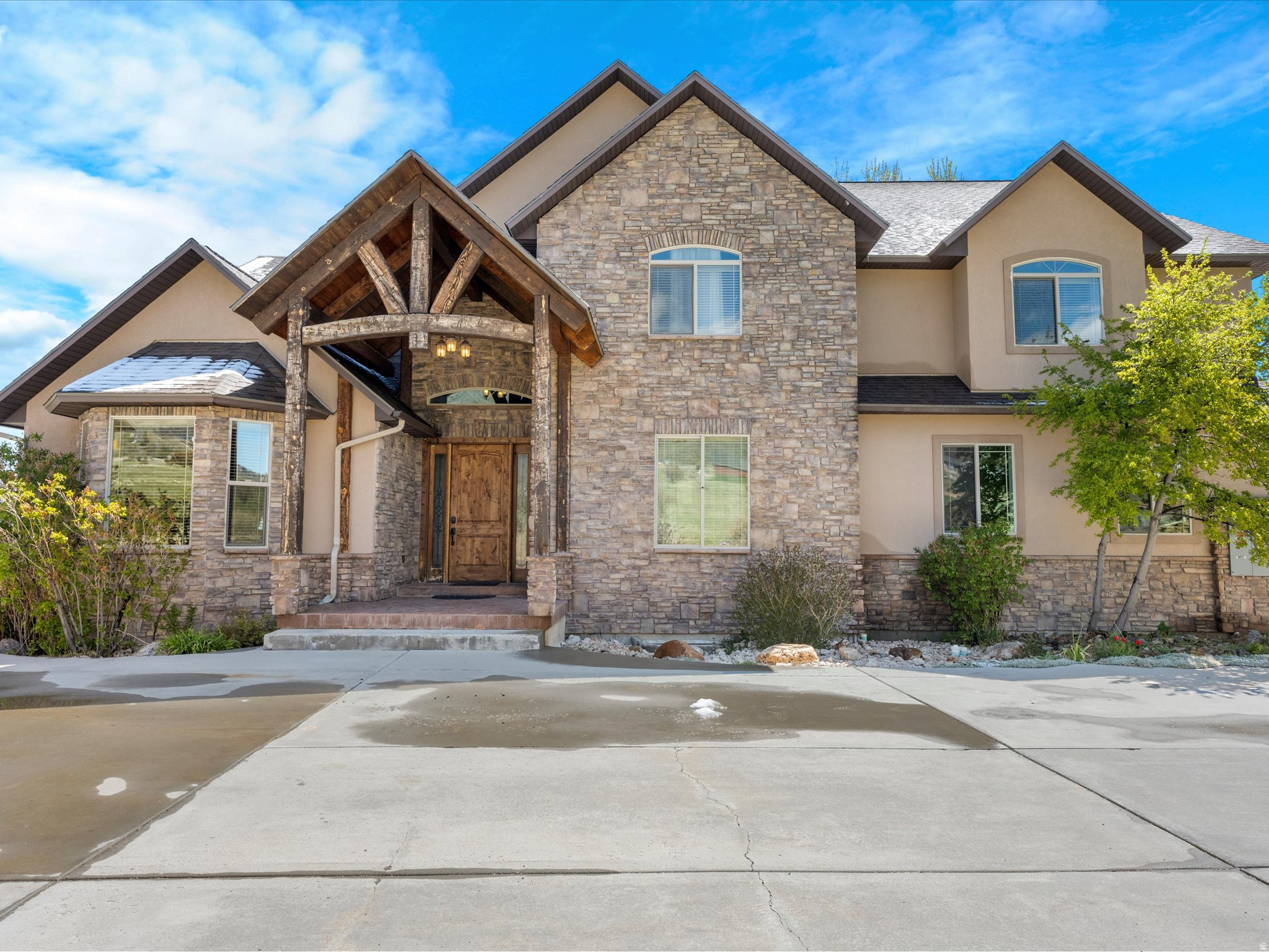 Gorgeous property with stunning BEAR LAKE and mountain VIEWS, 8000+ sq foot beautiful home on 1.82- acres with 5-car garage in quiet subdivision.  Spacious rooms, open gathering area, sun room with Jacuzzi hot tub.  Most furnishings included. Large grassy area for tents, games, basketball hoop, volleyball net, fire pit, full RV hookup.  5-minutes to Garden City for shops, food, MARINA.  5-minutes to Bear Lake West GOLF Course, Restaurant & Lounge.  Beaver Mountain SKI 25 minutes. NO STR. Square footage figures are provided as a courtesy estimate only.  Buyer is advised to obtain an independent measurement.