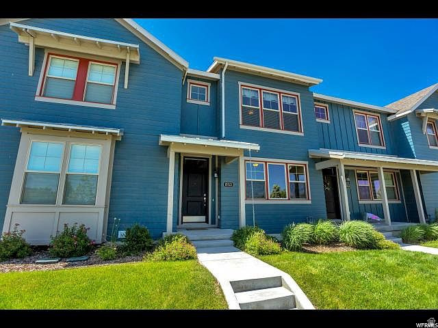 Located in East Lake Daybreak, this 4-bedroom, 3.5-bathroom townhome offers plenty of space in one of Utah's most desirable communities. The main floor features an open layout with large windows that bring in great natural light, along with a kitchen that offers plenty of cabinet and counter space. The finished basement adds a second living area, fourth bedroom, and full bathroom, giving you flexible space for guests, a home office, or everyday living. Upstairs you'll find the primary suite along with two additional bedrooms and another full bathroom. Enjoy everything Daybreak has to offer, including North Shore Beach, parks, walking trails, shopping, restaurants, and community events, all just minutes from your front door. If you're looking for a move-in ready home in a great neighborhood, this one is worth a look.