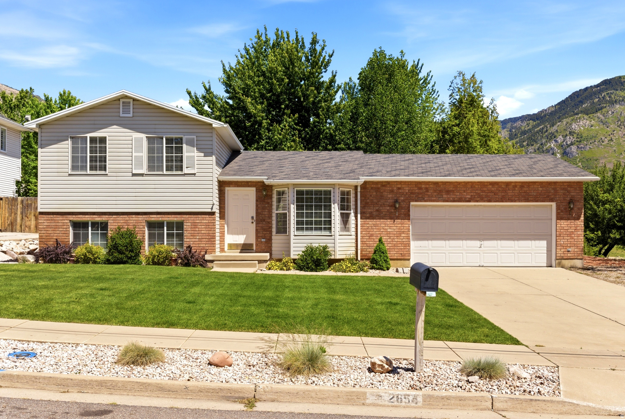 Welcome home to this spacious North Ogden property featuring 4 bedrooms, 2 bathrooms, and multiple living areas with room for everyone! The main level offers a formal living room, tile kitchen, convenient laundry access, and a functional layout including a master bedroom with Jack-and-Jill bathroom access.   The fully finished basement includes 2 additional bedrooms, a bathroom, laundry area, and an oversized second basement living room perfect for entertaining, a game room, theater space, or additional family room.   Enjoy the fully fenced backyard complete with a large 20x12 shed and RV parking with plenty of space for toys, trailers, or extra vehicles. Additional features include a water softener, newer water heater, newer furnace, 220 power for a hot tub, etc., and both gas and electric dryer hookups. Conveniently located near schools, parks, shopping, and mountain recreation.