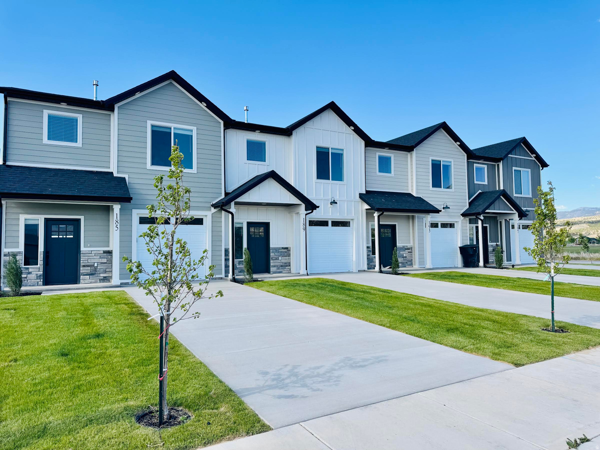 **The builder is offering up to $5,000 in seller concessions toward closing costs, rate buy-downs, or prepaid expenses.** Welcome to this stunning modern townhome nestled in Ephraim, the hub of Sanpete county! This townhome features upgrades that go well beyond what's typically offered in comparable properties. These loaded upgrades include all stainless steel appliances, washer & dryer set, enhanced insulation for added noise control and comfort, blinds throughout, a fully fenced private patio, and a beautifully landscaped yard. Enjoy ample space and privacy with three bedrooms, including a primary suite with a walk-in closet and en-suite bathroom. With its proximity to grocery shopping and dining, this home is lock-and-key, low maintenance property. This property qualifies for the USDA housing grant, an amazing $20K towards your purchase!!! Don't miss out on the opportunity to own this exquisite townhome! Schedule a viewing in our model and explore the possibilities. Multiple units are available.