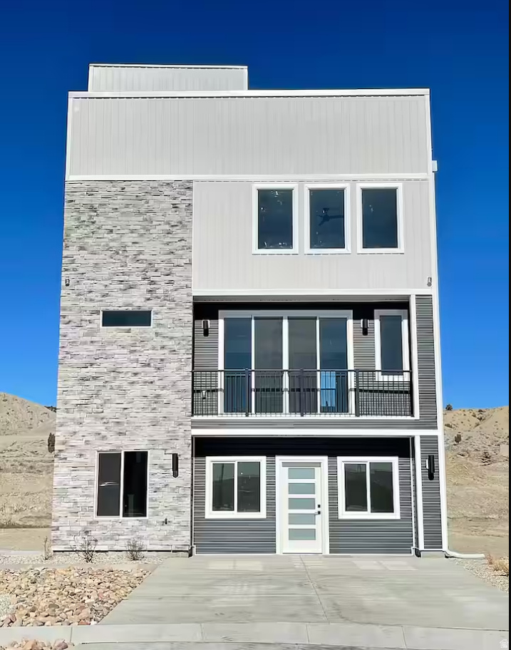 Stylish modern home with 3 bedrooms and 3.5 baths, designed for comfortable living and entertaining. Enjoy stunning views from the rooftop patio-an ideal space for morning coffee or evening sunsets. Studio apartment on ground level with separate entrance. Large walk in closets. Located just minutes from mountain bike trails and an elementary school, this home offers the perfect blend of adventure and convenience.  Square footage figures are provided as a courtesy estimate only and were obtained from agent measurements.  Buyer is advised to obtain an independent measurement.