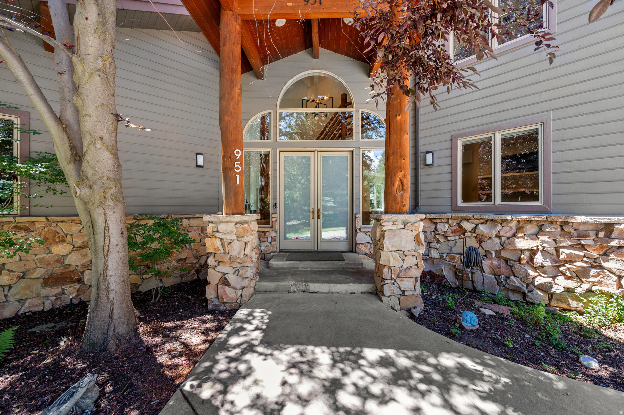 RANCH PLACE!!! This home is a retreat in a family neighborhood. Close to a little park, views and a full on walking trail; a home you deserve, in a peaceful serene setting. The vaulted ceilings with large open daylight windows offers an airy floorplan with a gorgeous fireplace that leads to a large party patio.  Along with the semi-formal dining area, the kitchen features a large center island and bar. It is perfect for entertaining family and guests. 3 large bedrooms upstairs with walk in closets, 2 full baths. The vaulted main floor bedroom also has a fun loft in addition to an office/den. The downstairs half bath for your guests could easily be transformed back into a full bath. Large 3 car garage with room for RV. So much more!