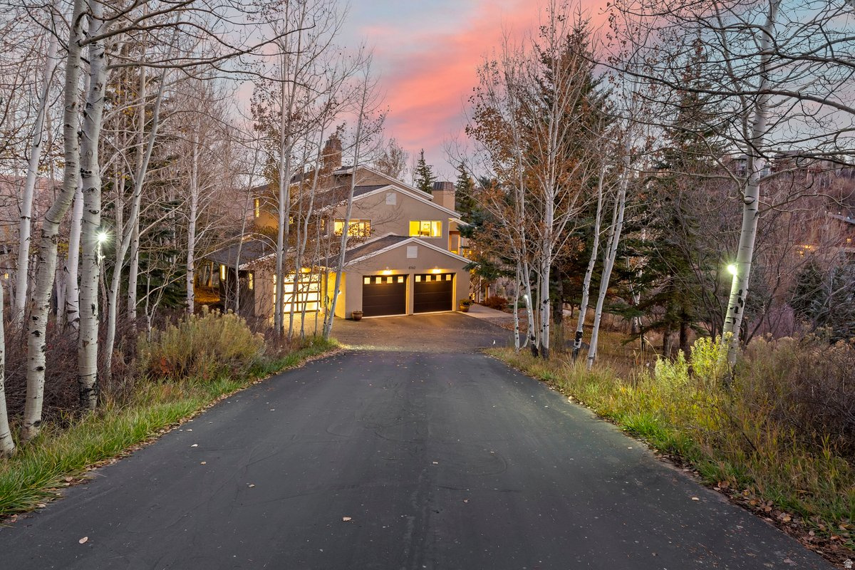 Peaceful mountain retreat on a private one-acre lot in Park City's Hidden Cove. Ideally located minutes from Park City Mountain, Deer Valley Resort, and Historic Park City Main Street dining and shopping. Expansive windows capture beautiful views of the Wasatch Range and fill the home with natural light. The open floor plan features soaring ceilings, five bedrooms, a versatile loft, and two spacious great rooms perfect for gathering or entertaining. A private yoga studio offers a peaceful space for wellness and relaxation. Enjoy the large decks, quiet surroundings, and mountain sunsets. The home also includes a high-end water filtration system and new small-duct heating system for added comfort and efficiency. A perfect full-time residence or luxury mountain getaway.