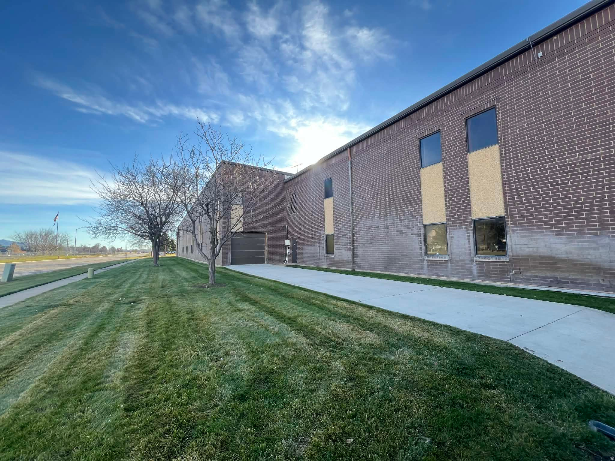 Available for lease within the well-situated Weber Industrial Park, this property offers flexible space options ranging from approximately 4,863 to 10,039 square feet. Zoned Weber County M-1, the facility features secure indoor storage on the main level, complemented by a 10-foot high by 10-foot wide overhead door for convenient loading and unloading. Additional space is available upstairs to accommodate various operational needs. With direct access to the freeway and major roads, the location ensures excellent connectivity for both employees and logistics. Tenant improvements are negotiable, providing opportunities to customize the space to suit your business requirements.