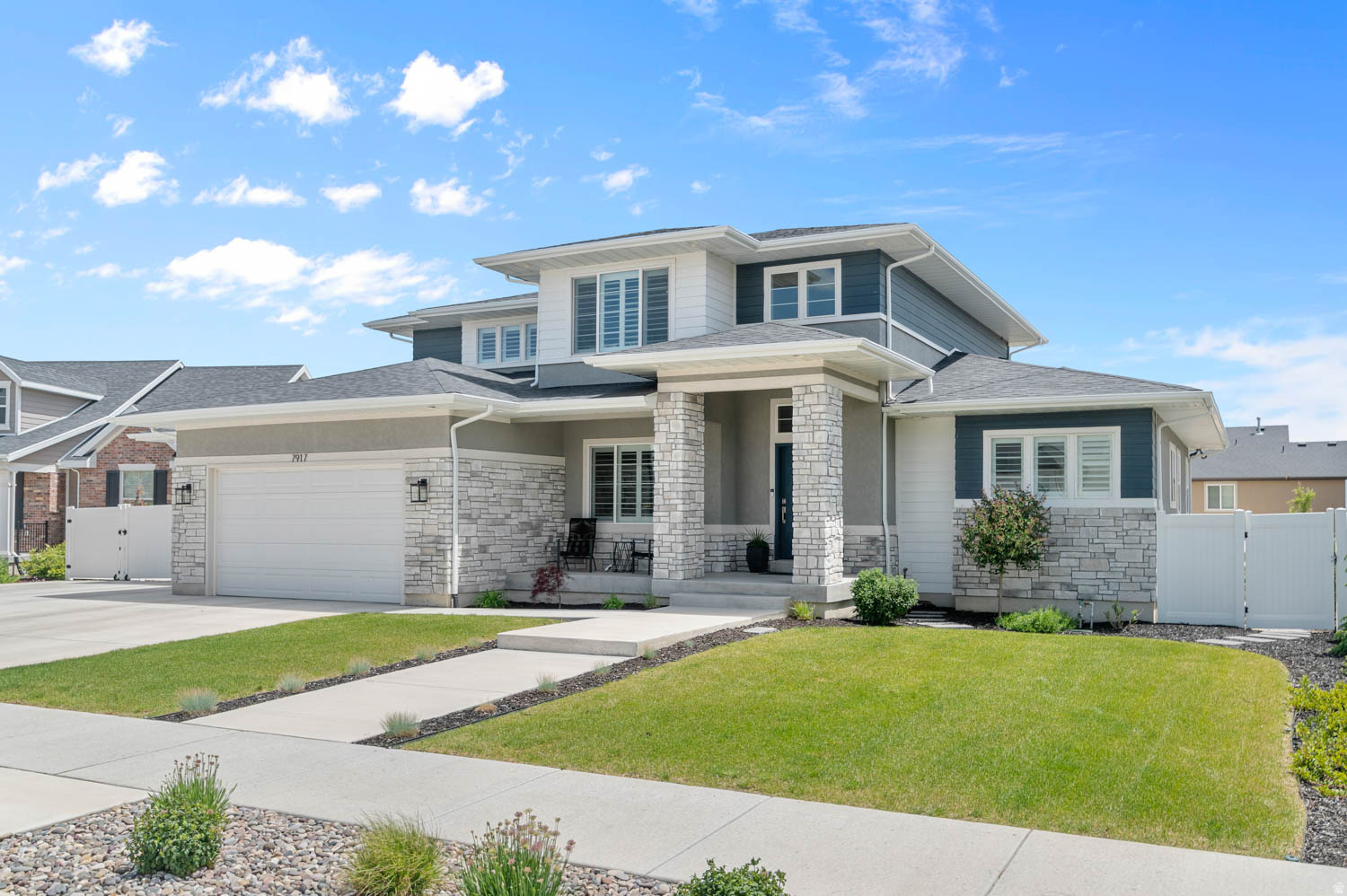PRICE DROP! Beautiful West Jordan home on an expansive 0.27-acre lot with mountain views, RV parking, and an incredible backyard setup! Built in 2022, this spacious 2-story home offers over 4,500 square feet with a bright, open layout and abundant natural light throughout.  The main level features a stunning great room with a soaring vaulted ceiling and an upgraded kitchen with quartz countertops, double wall ovens, a large island, walk-in pantry, and modern finishes designed for both entertaining and everyday living. Also located on the main floor is the spacious primary suite which includes a walk-in closet and a luxurious en-suite bathroom with a separate tub and shower. Upstairs you'll find three additional generously sized bedrooms, offering plenty of space for family, work, or hobbies. The fully finished basement expands the home even further with additional living space, 2 bedrooms, storage, and endless possibilities for recreation or entertaining.  Step outside to a beautifully landscaped backyard featuring a covered patio, raised garden beds, full fencing, and plenty of room to relax, play, or entertain. The property also includes a 3-car attached garage plus RV parking, providing exceptional space for vehicles, toys, and storage.  Located in the desirable Orchard Heights community, residents enjoy access to a community pool, park, playground, hiking trails, and picnic areas. Conveniently close to schools, shopping, and commuter routes, this home combines space, comfort, and lifestyle in one exceptional package.