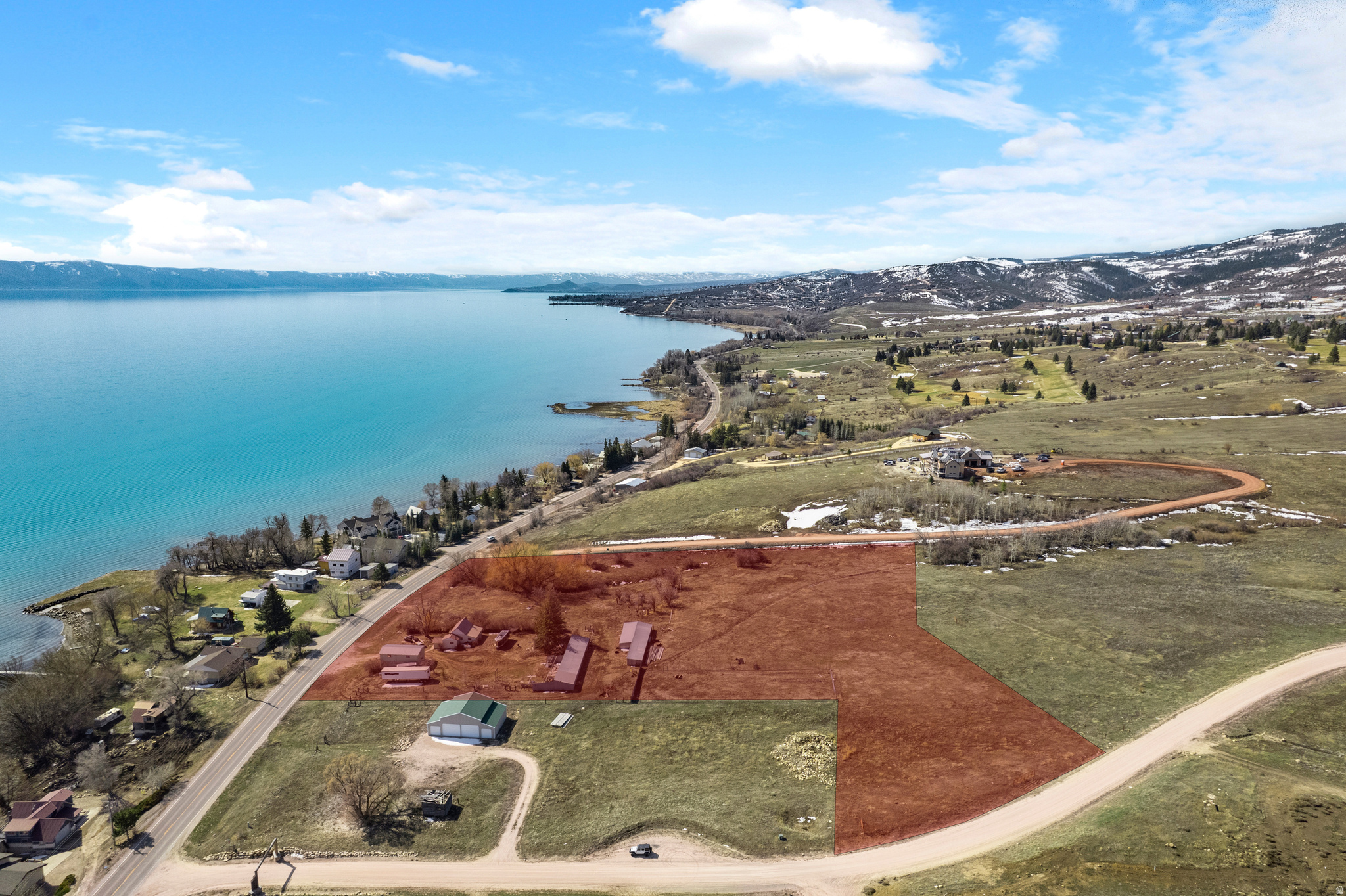 This stunning 7.24-acre parcel in Fish Haven, Idaho, offers a rare opportunity to own a spacious piece of land with breathtaking views of Bear Lake and private beach access. Opportunity to subdivide or develop up to 7 LOTS. Nestled in a serene and scenic setting, this property provides ample space to build your dream home, family retreat, or investment property while enjoying the beauty of the surrounding mountains and crystal-clear waters of Bear Lake. With easy access to outdoor recreation, including boating, fishing, hiking, and ATV trails, this location is perfect for those who love nature and adventure. Whether you're looking for a peaceful getaway or a year-round residence, this property offers unmatched views, privacy, and access to one of the region's most sought-after destinations. Don't miss this incredible chance to own a slice of Bear Lake Idaho paradise. Property includes 2 parcels, 711 and 725 US Hwy 89. 2 parcels being sold together. Includes 20' wide lake access.