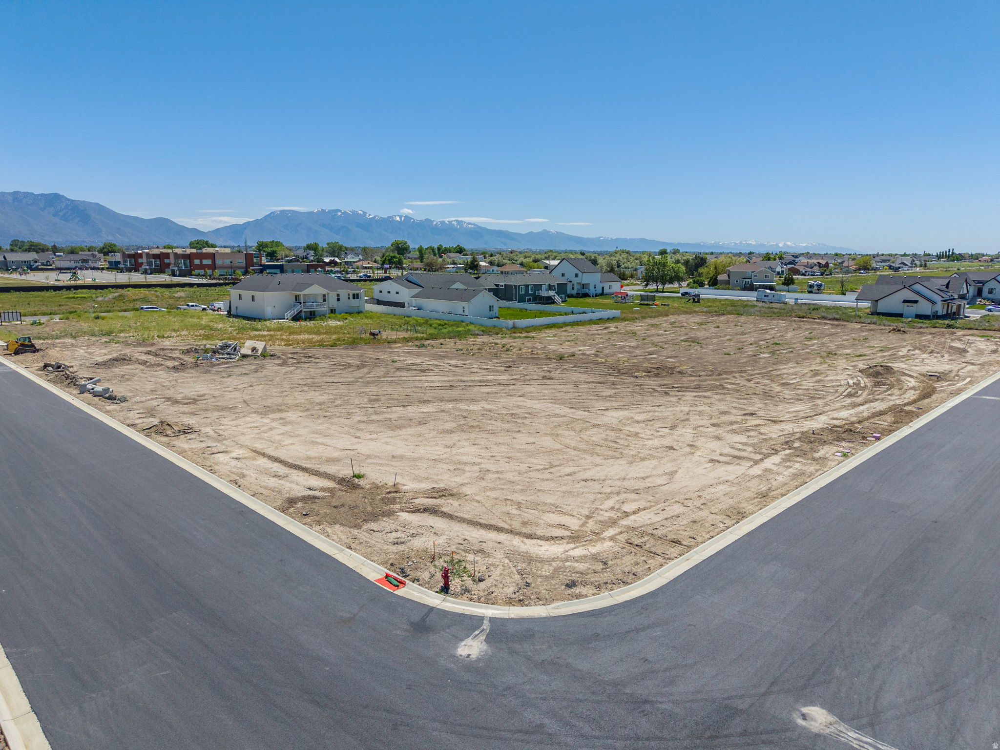 Lot 208 - Rawson Ranch - Phase 2 is a 28-lot subdivision in the peaceful countryside of Hooper, Utah, offering large, near half-acre building sites that are hard to find these days! These lots have stunning mountain views and ample space for a comfortable family home, barn, or shop, all without an HOA. You can choose your own builder, or we can happily recommend several reputable options. There are multiple lots currently for sale, please contact the listing agent to confirm which ones are available. If you value flexibility, space, and a serene rural setting within easy reach of amenities, Rawson Ranch is a great option! Reach out to discuss available lots, and start planning your custom home!